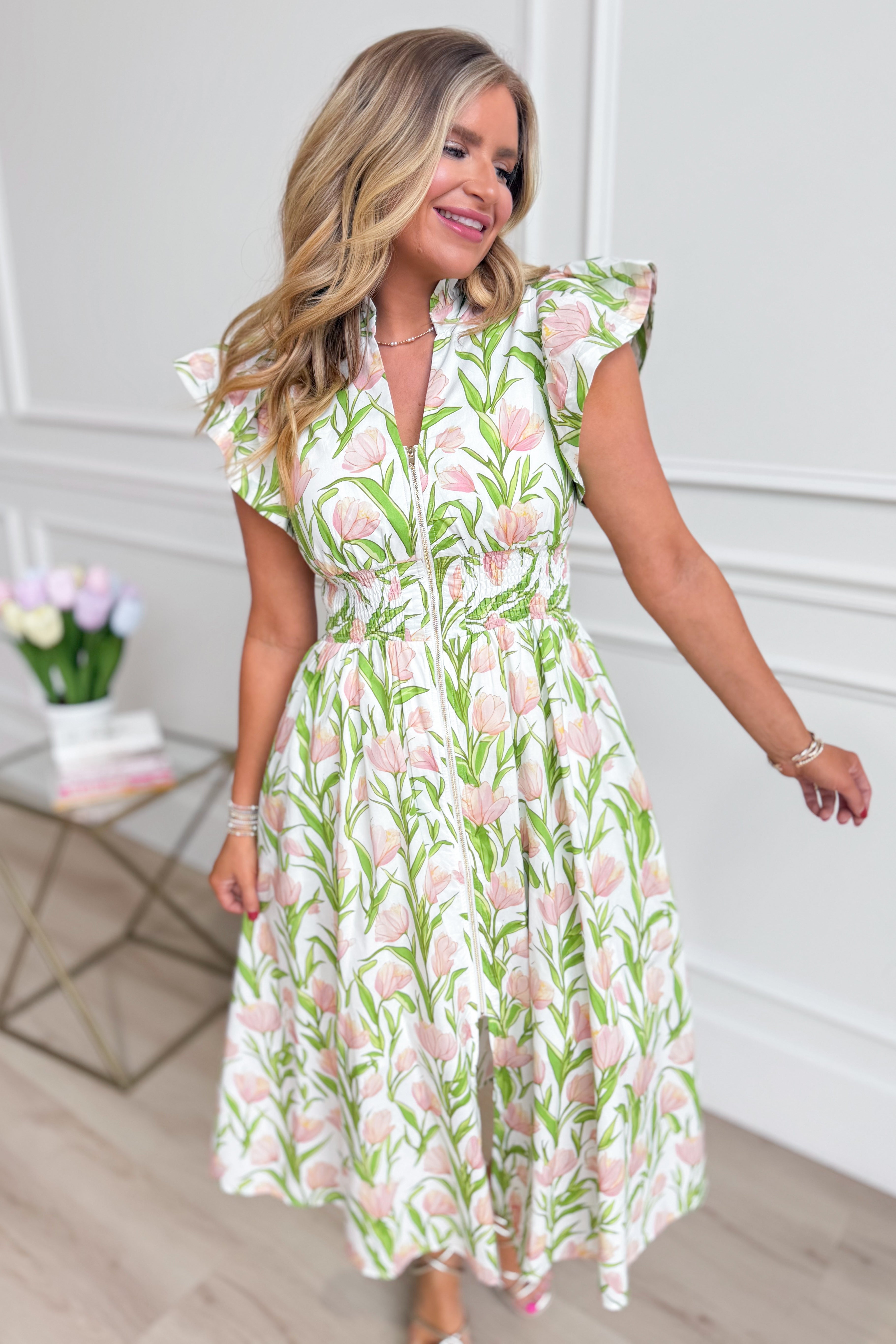 ENTRO Carson botanical floral printed dress, 125 dressy dress with vibrant floral pattern, displayed on a hanger.