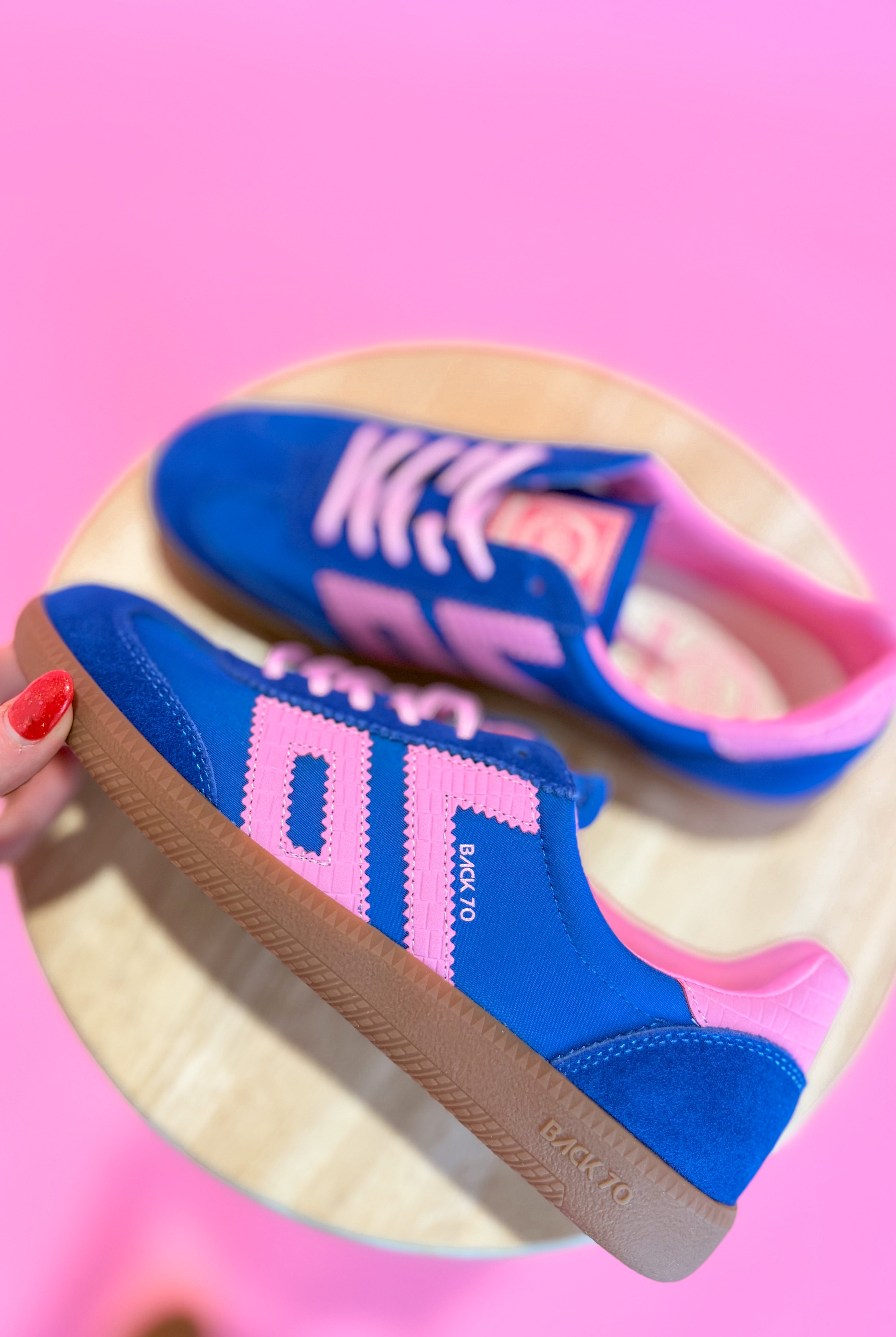 Back70 Ghost Sneakers in blue and pink with 205 model design, featuring a sleek athletic style and modern sneaker details.
