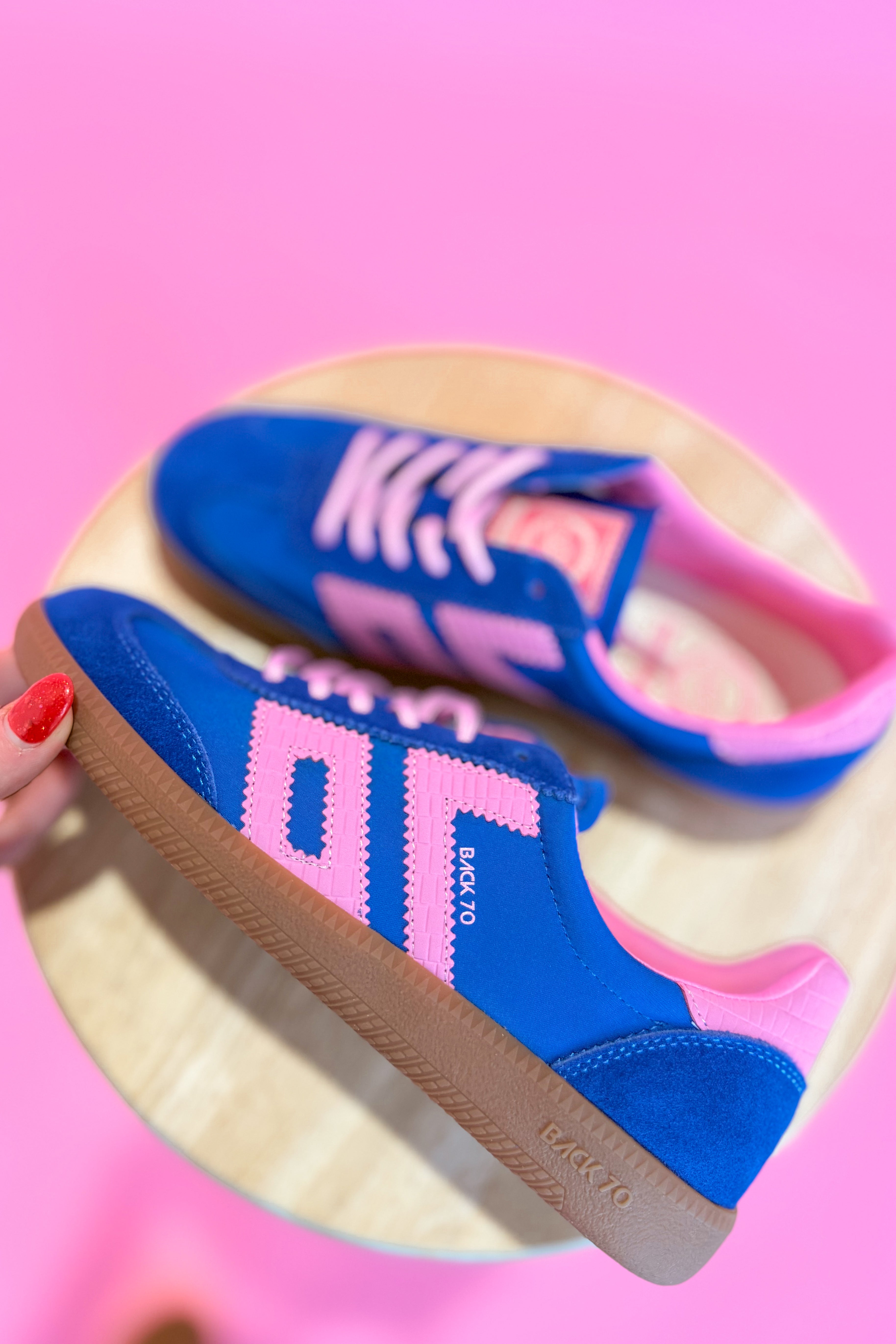 Back70 Ghost Sneakers in blue and pink with 205 model design, featuring a sleek athletic style and modern sneaker details.