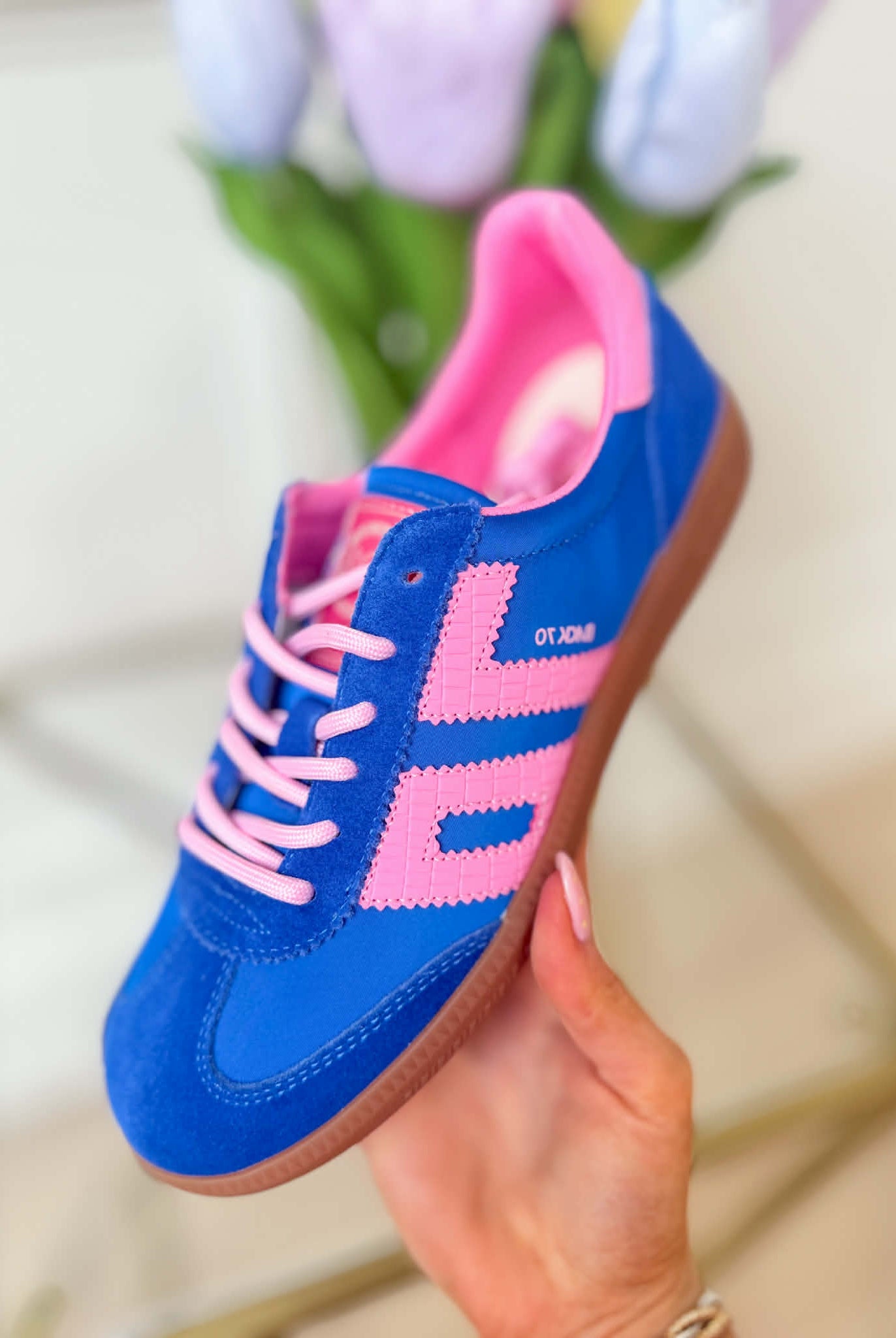 Back 70 Ghost Sneakers in blue and pink, stylish 205 sneaker design with breathable material and modern athletic look.