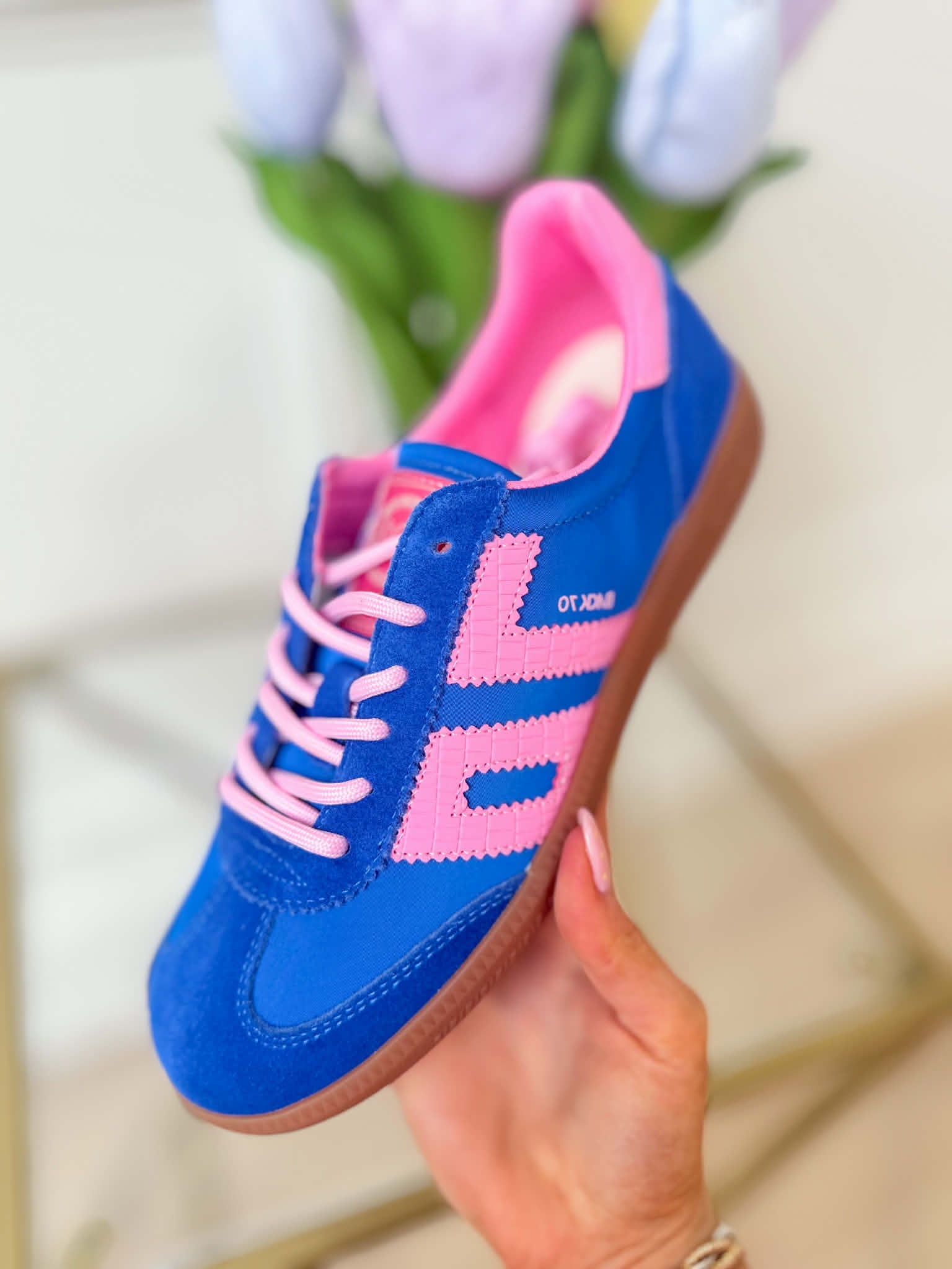 Back 70 Ghost Sneakers in blue and pink, stylish 205 sneaker design with breathable material and modern athletic look.