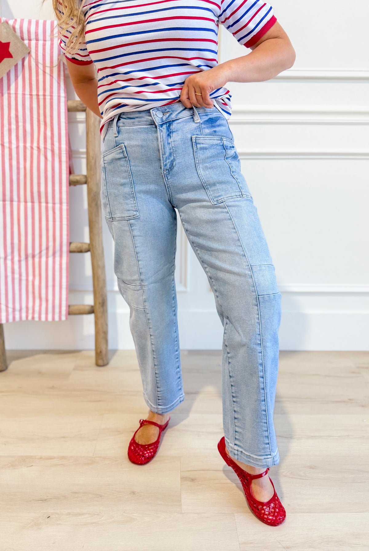 Risen Fredrick slouchy ankle boyfriend jeans in light wash denim, 146 Core style, displayed on a hanger.