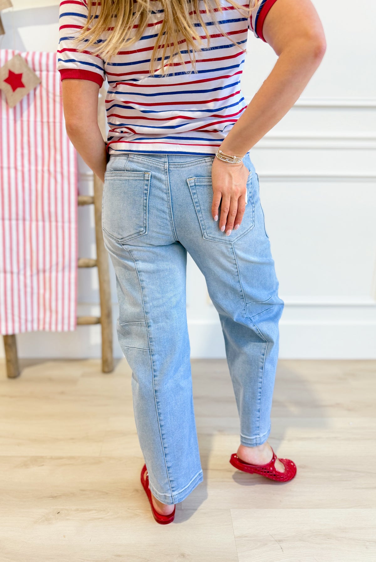 Risen Fredrick slouchy ankle boyfriend jeans in light wash denim, relaxed fit with distressed details and rolled cuffs.