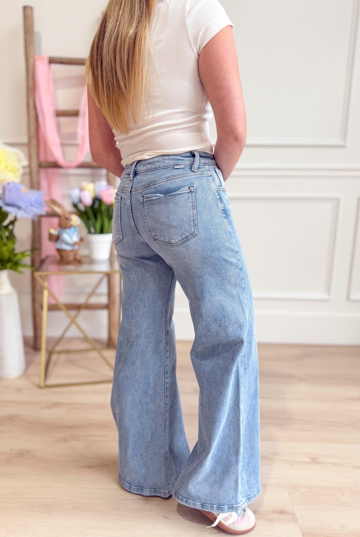 RISEN Conrad mid-rise shimmer wide-leg jeans in denim fabric with a relaxed fit and stylish design.