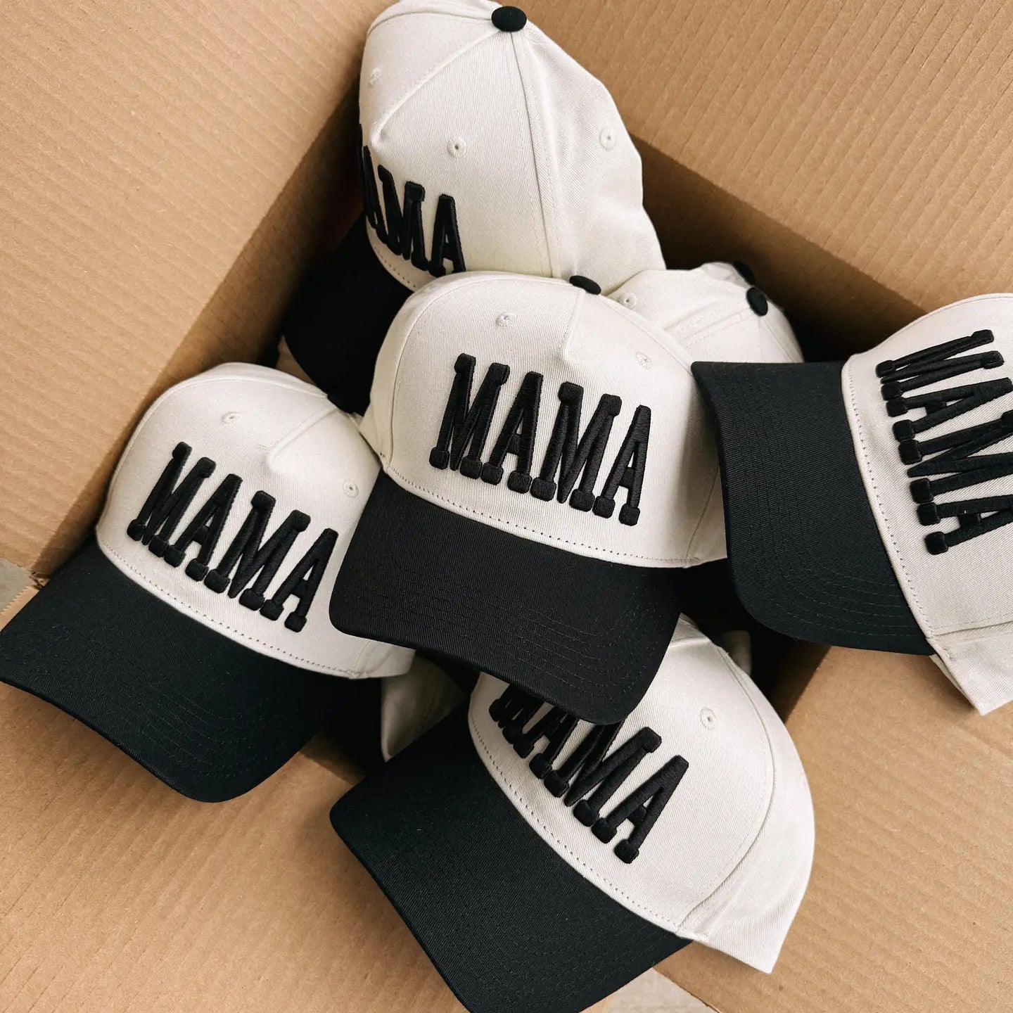 Mama Cream and Black Puff Trucker Hat by ETTA & EAST, featuring a cream crown and black puffed front panel.