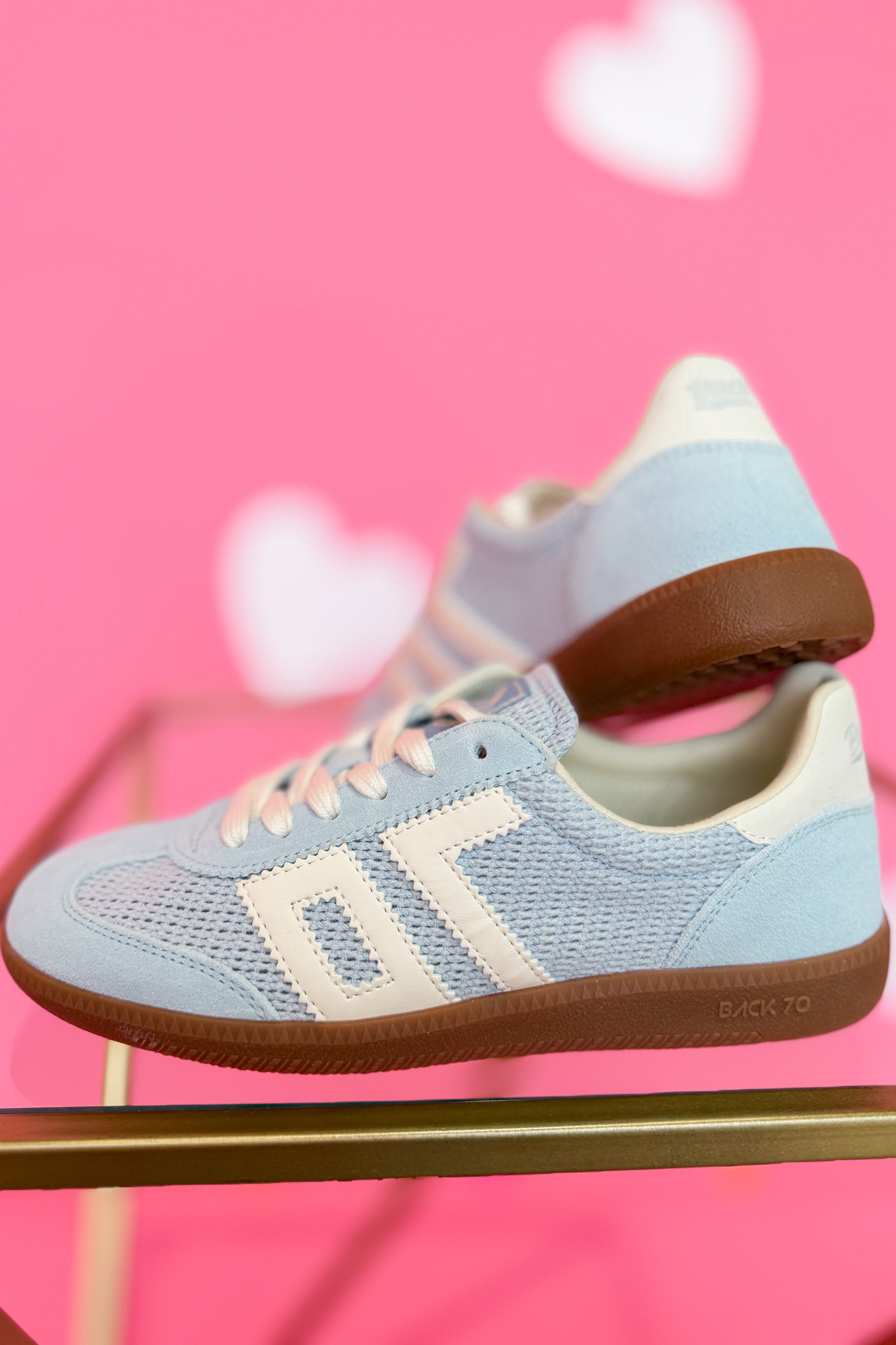 BACK 70 Ghost Sneakers in sky blue, 205 style, featuring a sleek design with white soles and breathable mesh material.