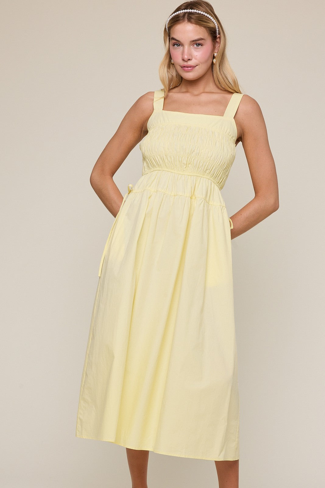 Wishlist Kurt Lemon smocked midi dress featuring a fitted bodice, midi length, and casual style in a vibrant lemon print.