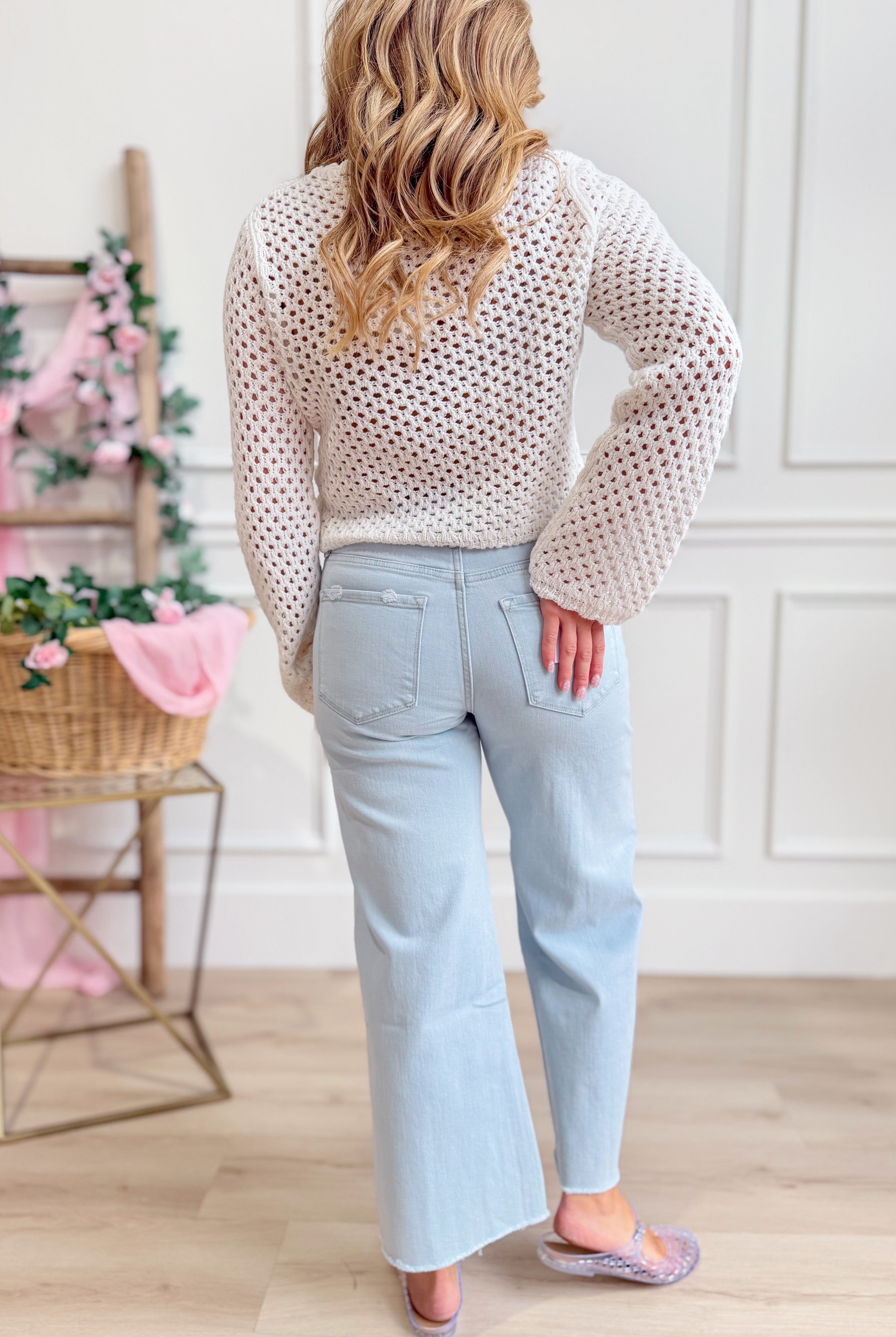 Vervet Olivia high rise wide leg core jeans in light denim, showcased on a model with a casual fit.