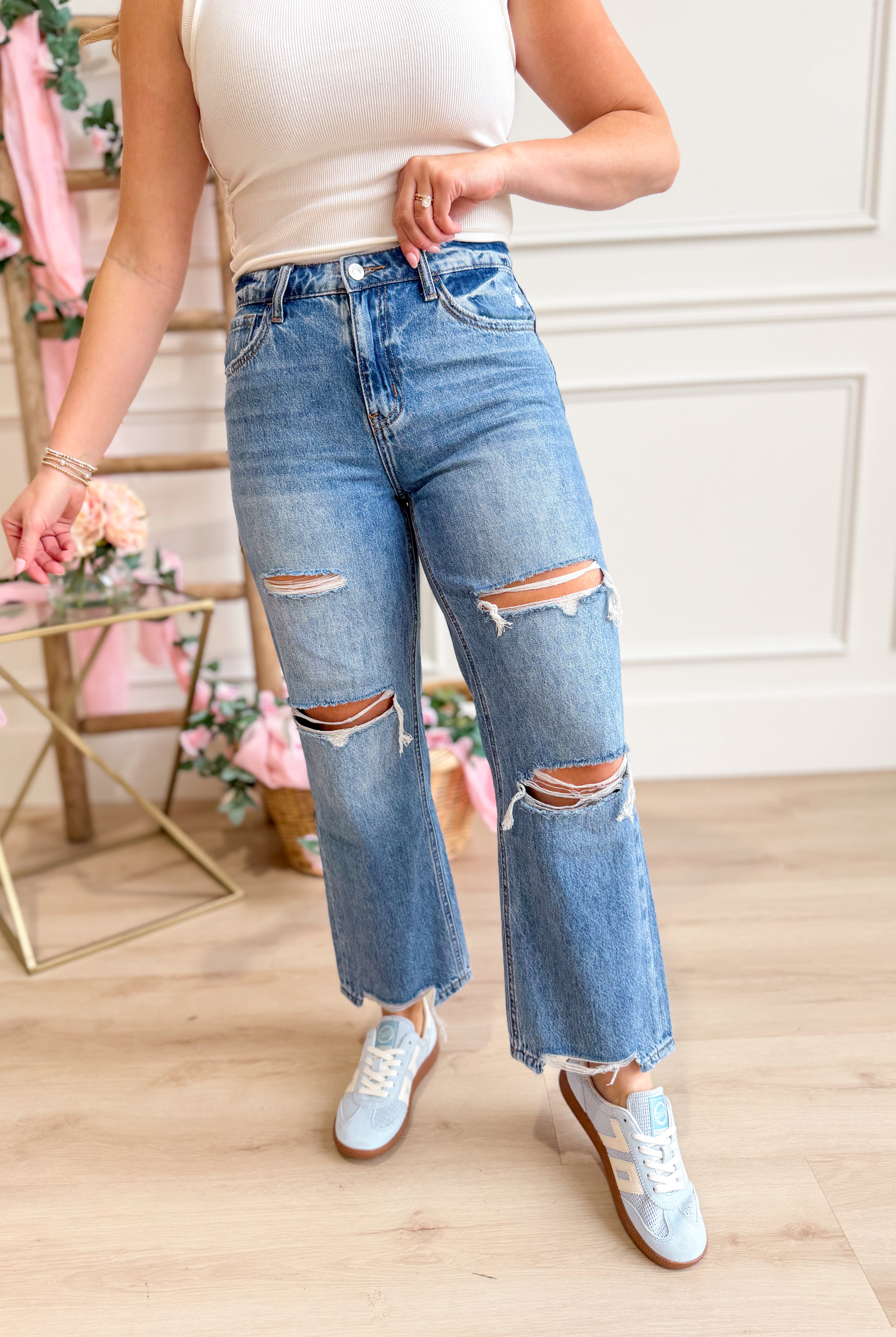 Vervet Frannie high-rise relaxed straight jeans in light denim, showcasing a classic fit with subtle fading and stitching details.