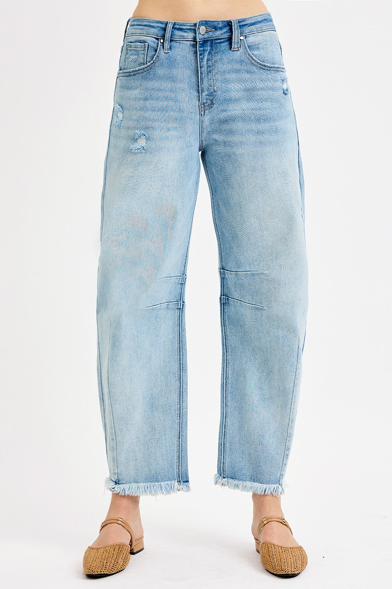Risen Nolan high rise barrel jeans in size 0-3XL, showing the classic denim fit and detailed stitching on a model.