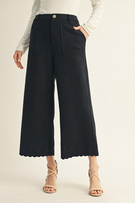 Jodifl Reis scallop trim wide-leg pant in neutral fabric, featuring a relaxed fit and scalloped hem detail.