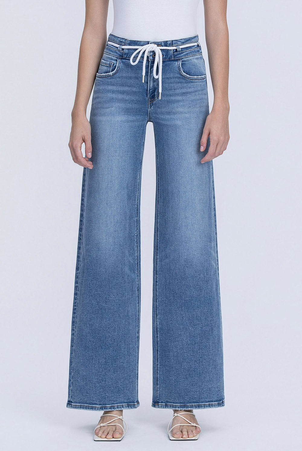 Vervet Olivia high-rise double button drawstring jean from 146 Core Jeans collection, shown in denim with double button waist and drawstring detail.