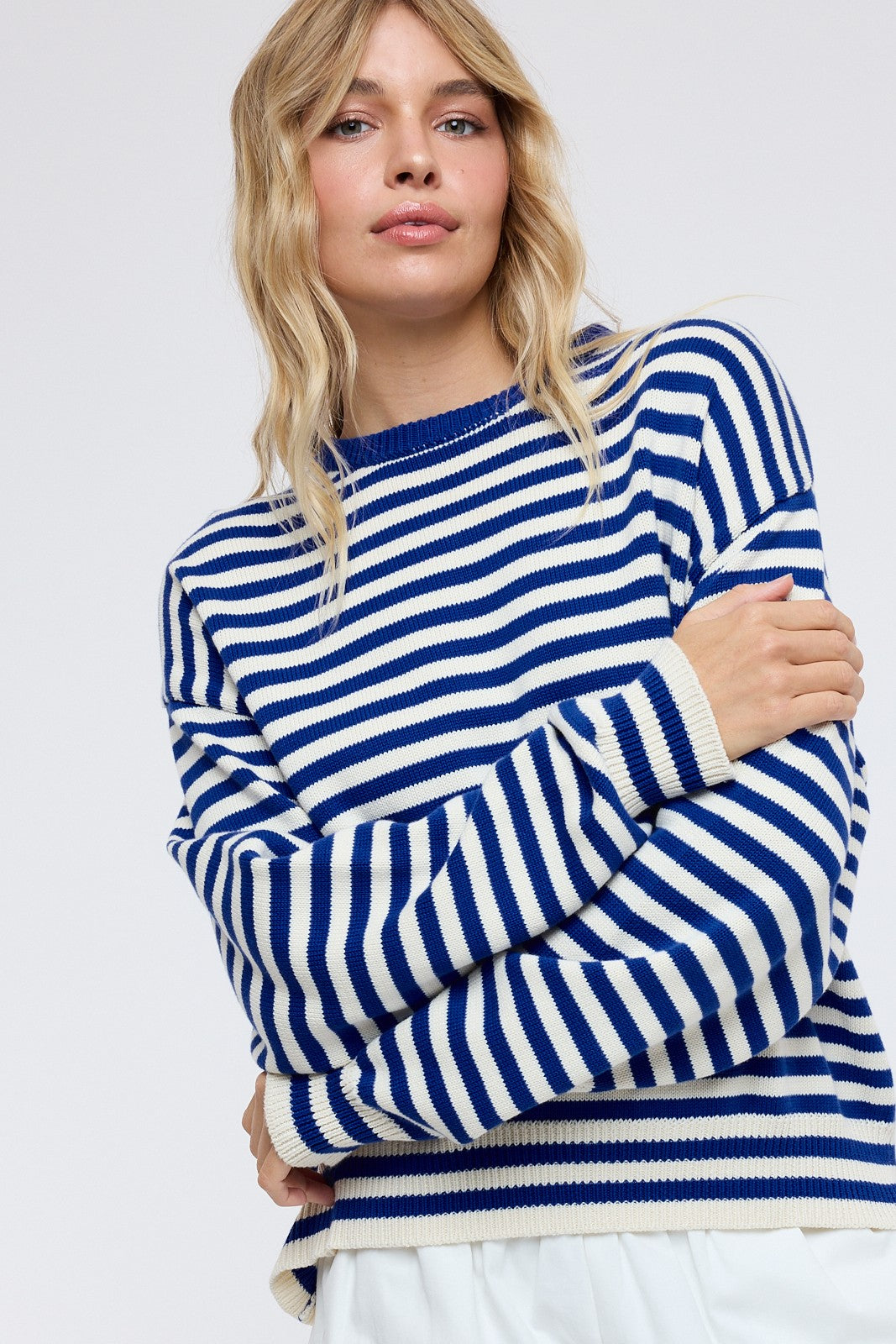 WISHLIST Haley striped drop shoulder spring sweater in pastel colors, featuring relaxed fit and cozy knit fabric.