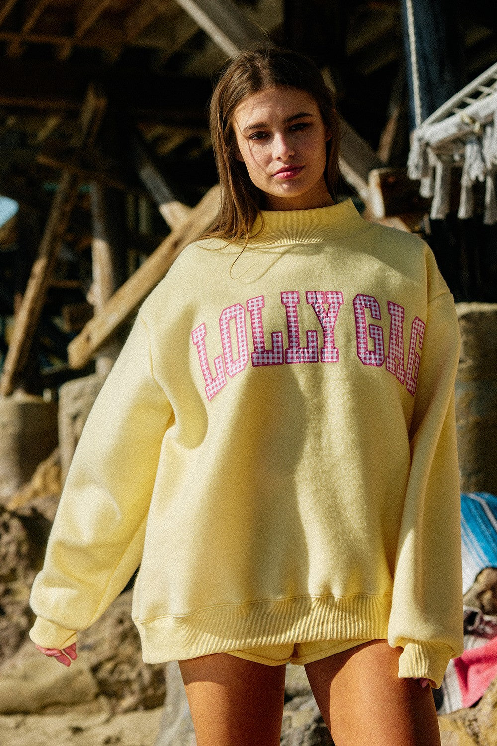 Reversible mock neck sweatshirt from BUCKET LIST's 137 Graphic Sweatshirts collection, featuring bold graphic design on the front and back.