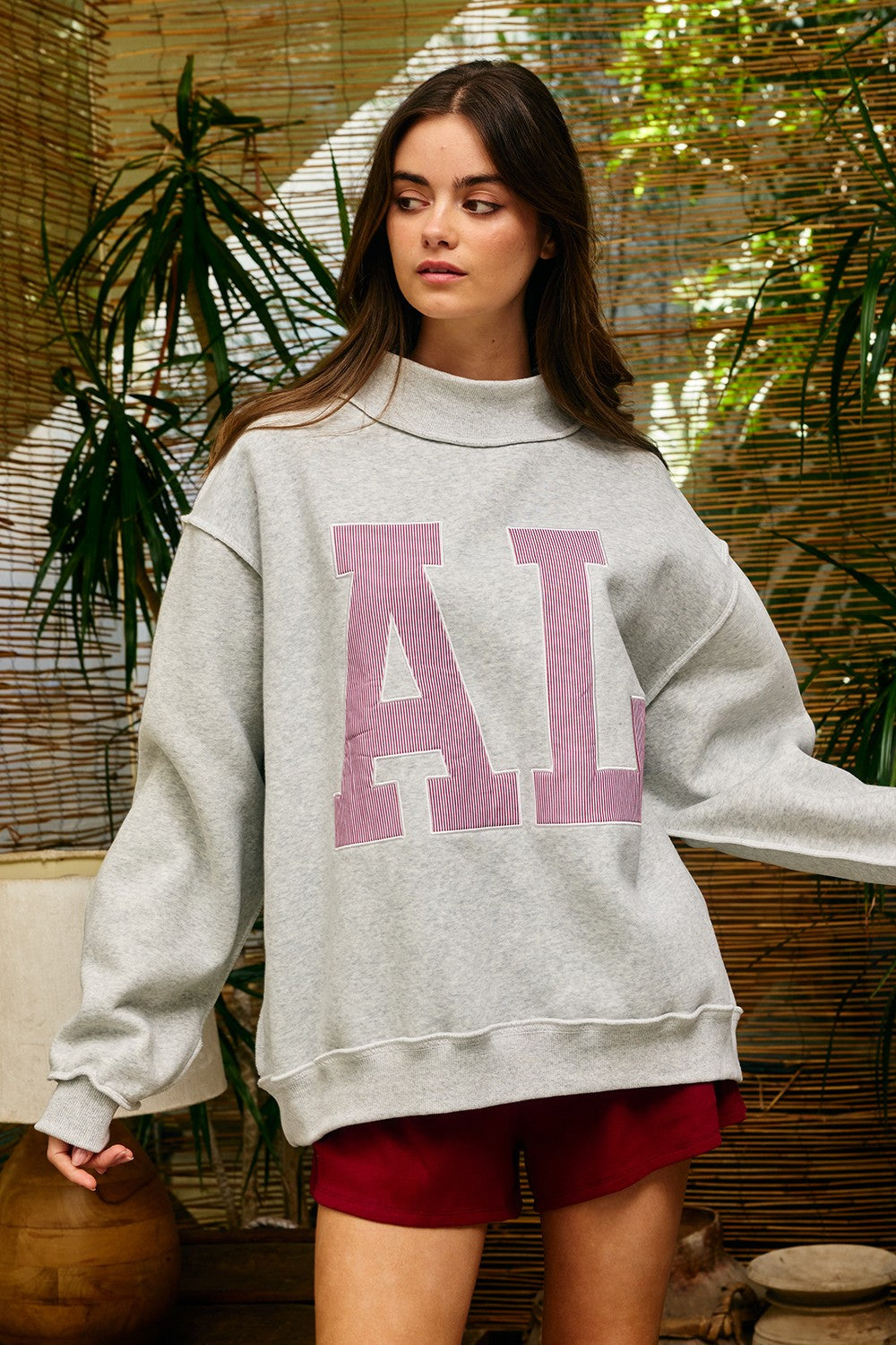BUCKET LIST Alabama mock neck embroidered sweatshirt with graphic design, featuring a comfortable fit and detailed embroidery.
