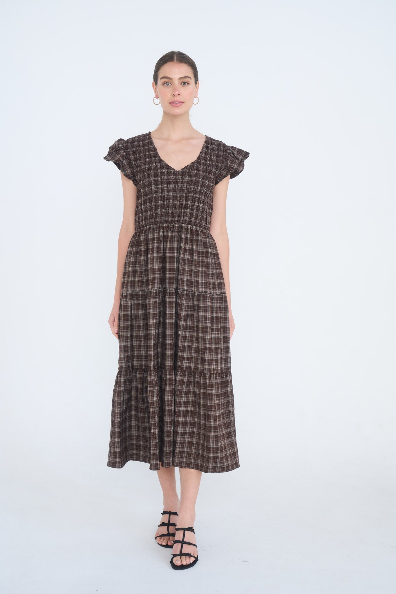 BLU PEPPER Colleen plaid V-neck smocked dress with long sleeves and a flowy skirt, perfect for dressy occasions.