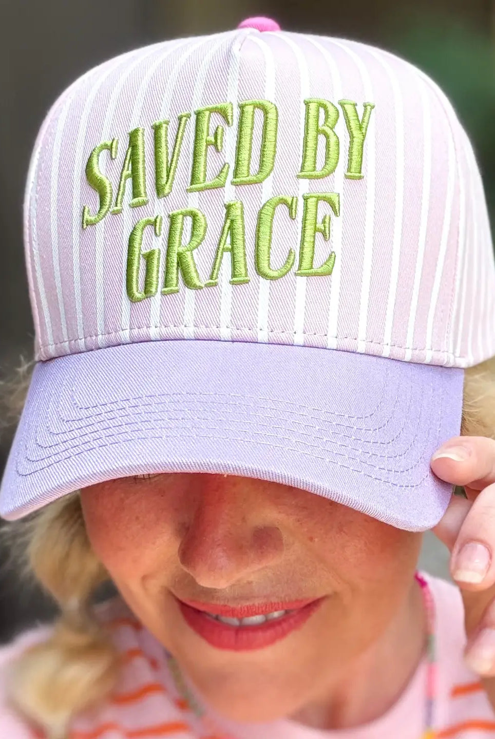Saved By Grace baseball hat by TAYLOR ELLIOT DESIGNS, black cap with embroidered design, casual accessory for everyday wear.