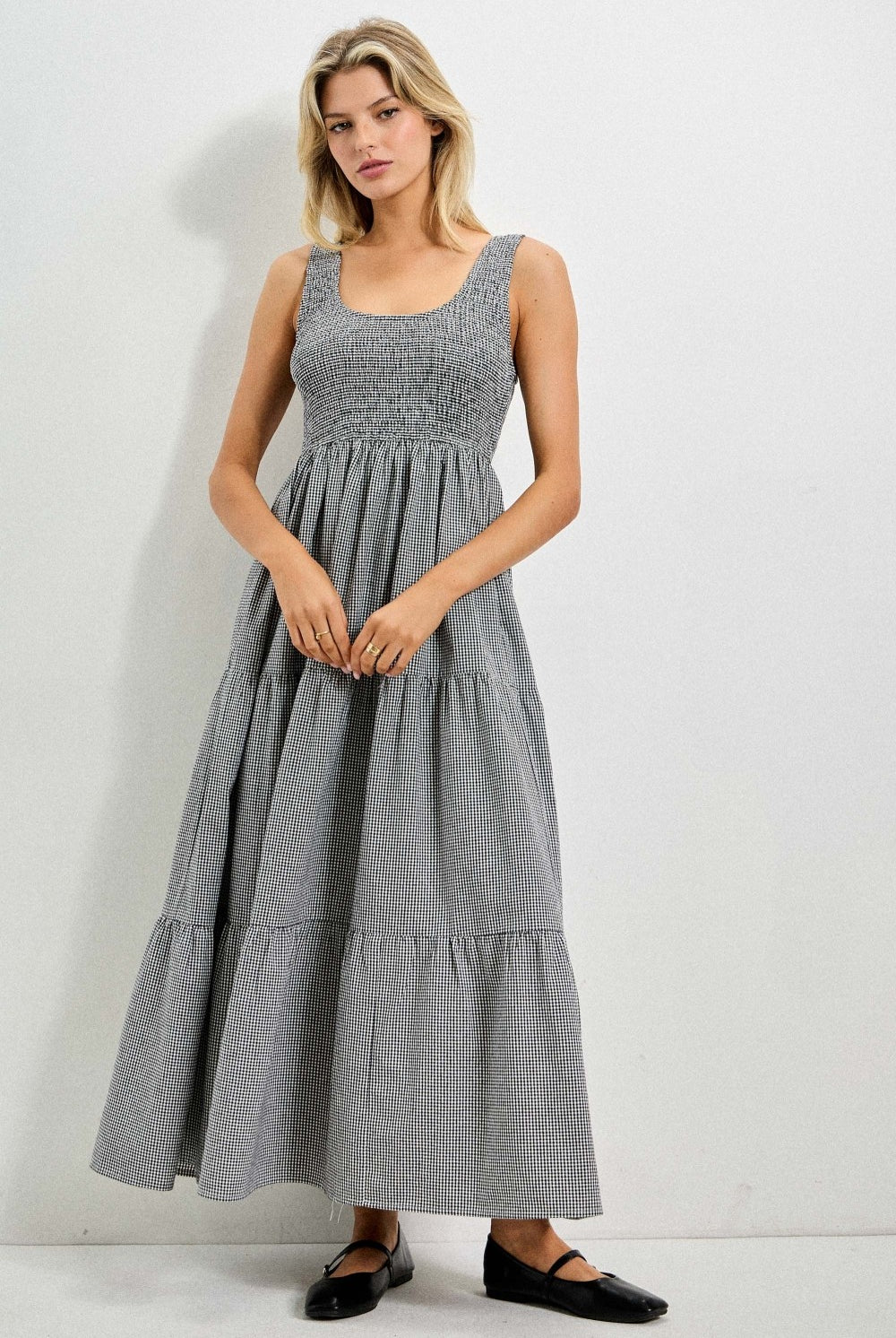 Baevly Painter Gingham Midi Dress with a fitted bodice, sleeveless design, and classic gingham pattern ideal for dressy occasions.