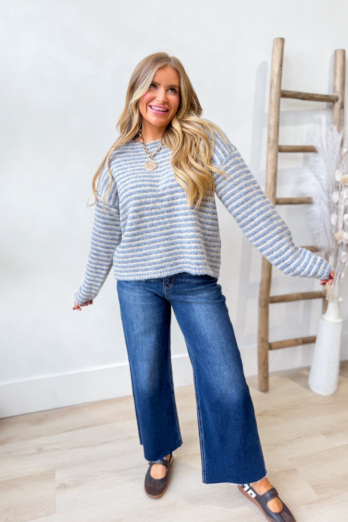 TWENTIFOURTH Chelsea multi-striped fall sweater featuring a cozy knit design with colorful horizontal stripes.
