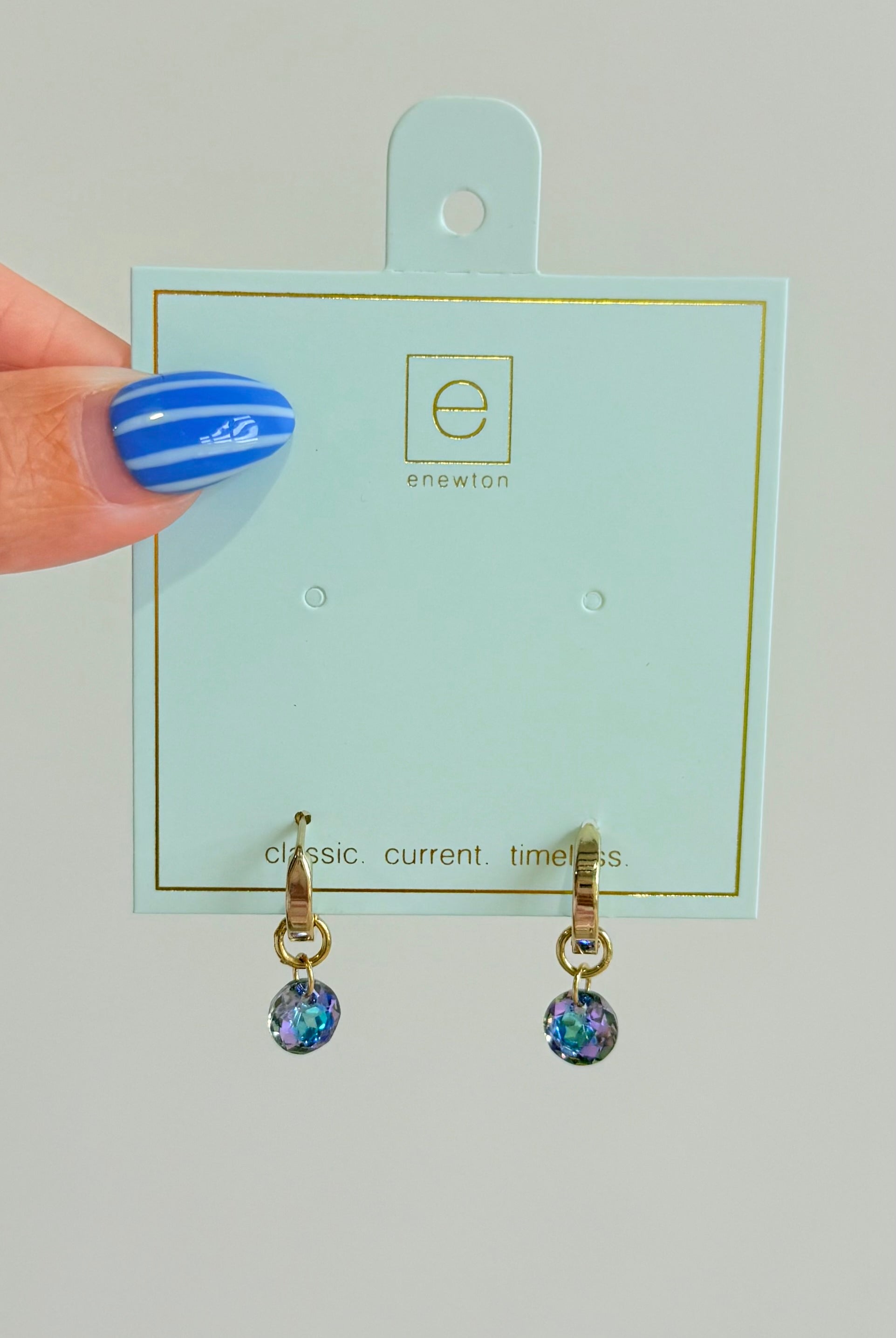 Enewton .5mm Classic Birthstone Huggie earrings with small gemstones in silver or gold setting, stylish and elegant jewelry.