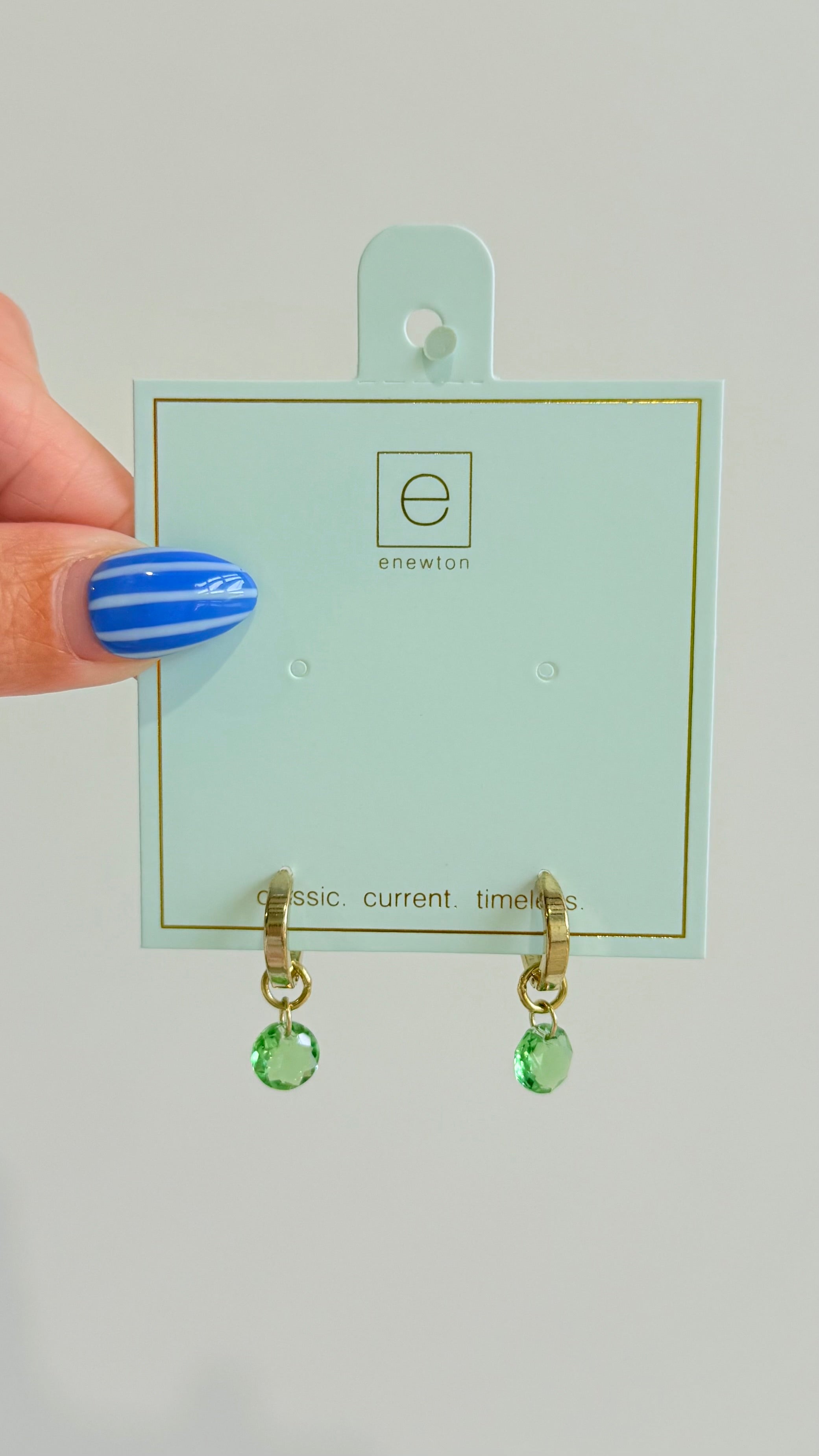 Enewton .5mm Classic Birthstone Huggie earrings in silver with small colorful birthstone accents, designed for pierced ears.