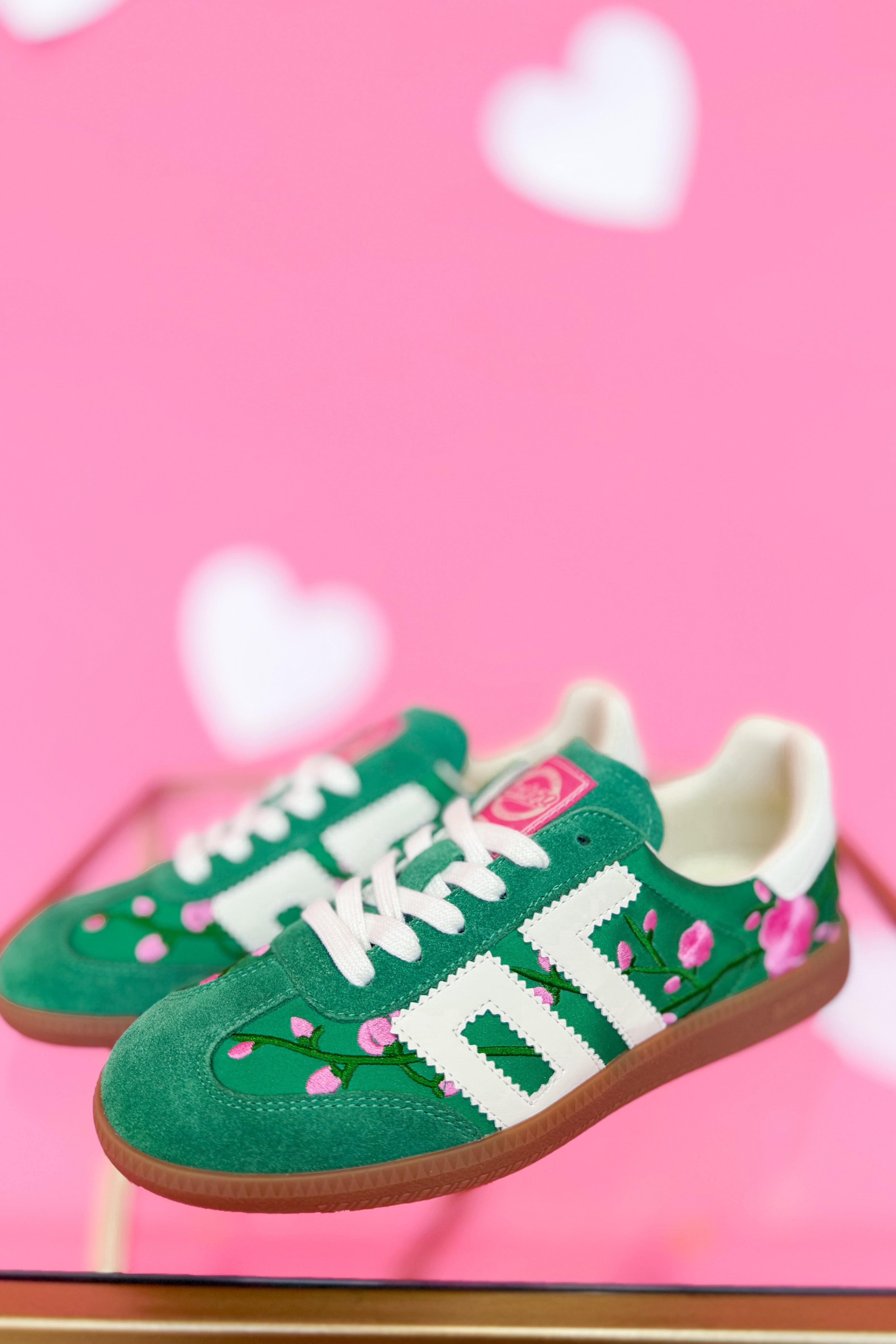 BACK 70 Ghost Sneakers 205 with floral green design, showcasing stylish green and white sneakers with floral accents.