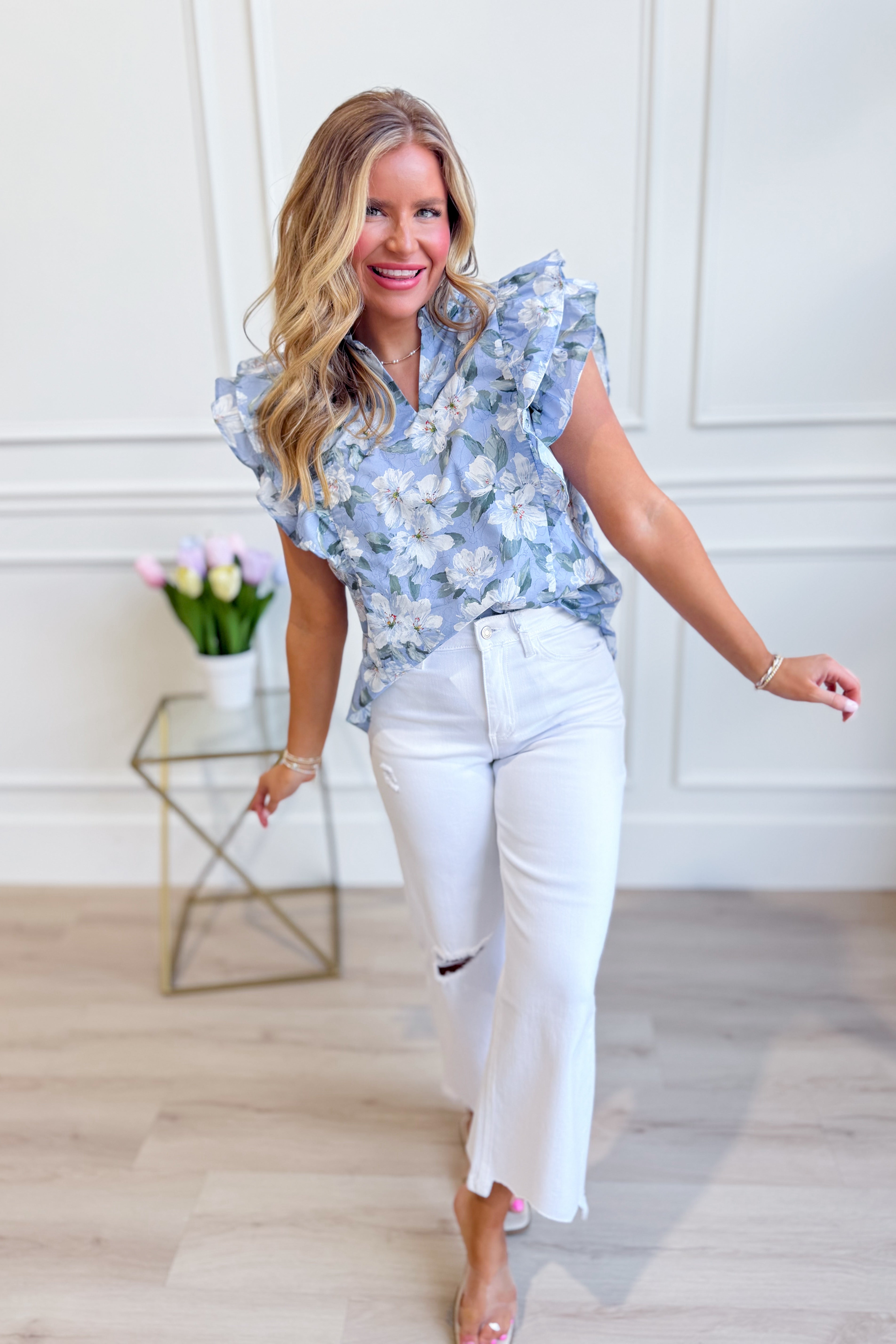 She + Sky Lori ruffle sleeve printed top from the 131 Spring Sweaters collection, featuring colorful floral patterns and ruffle details.