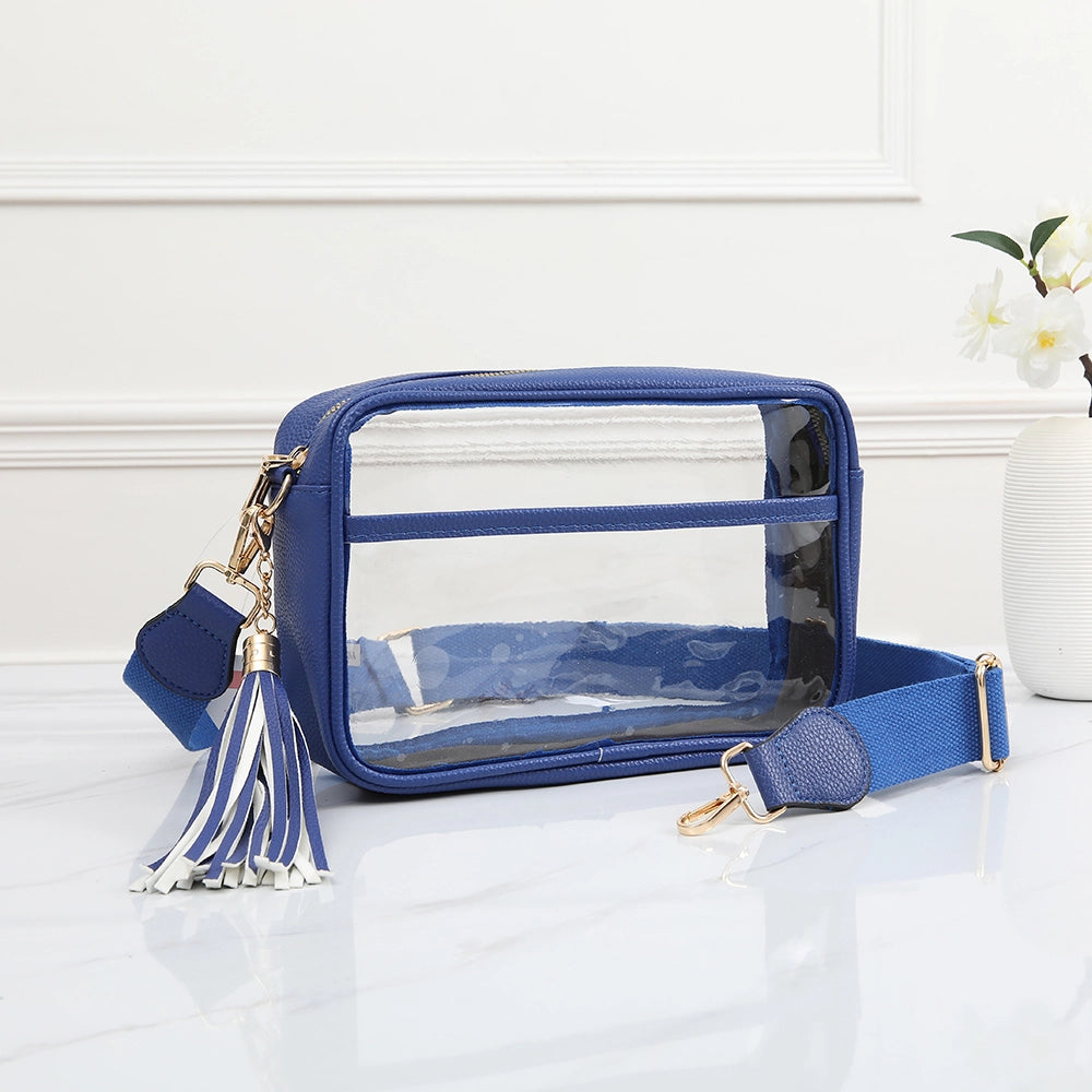 Blue clear stadium crossbody bag by QUEENS DESIGNS, featuring transparent material and adjustable strap for sporty style.