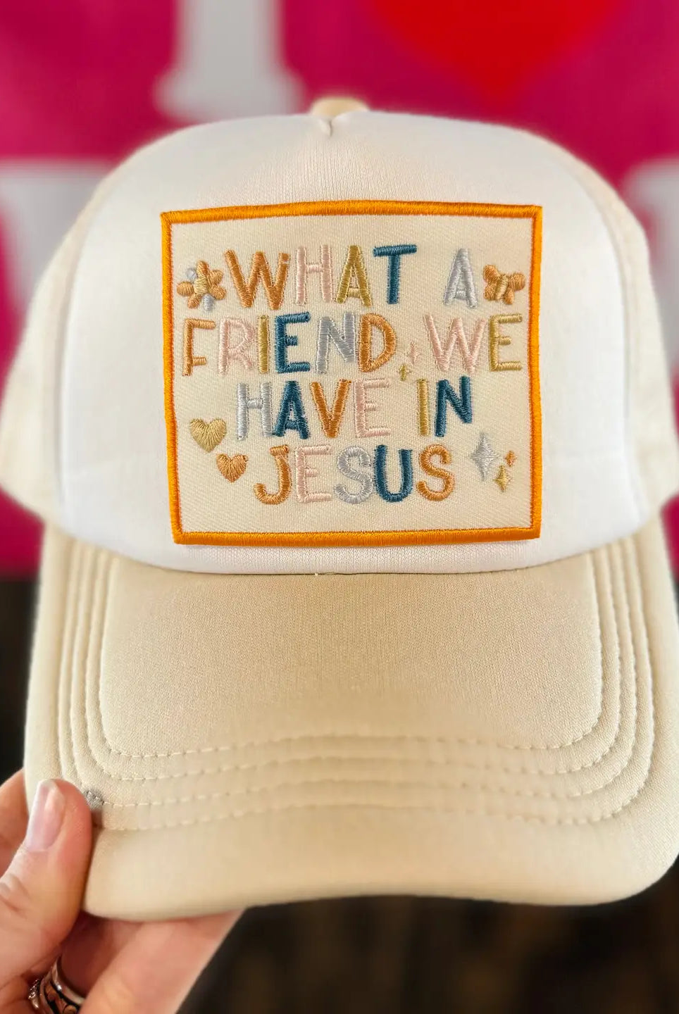 GOSPEL GEAR CO embroidered foam trucker hat featuring "What A Friend In Jesus" design, casual headwear with embroidered details.