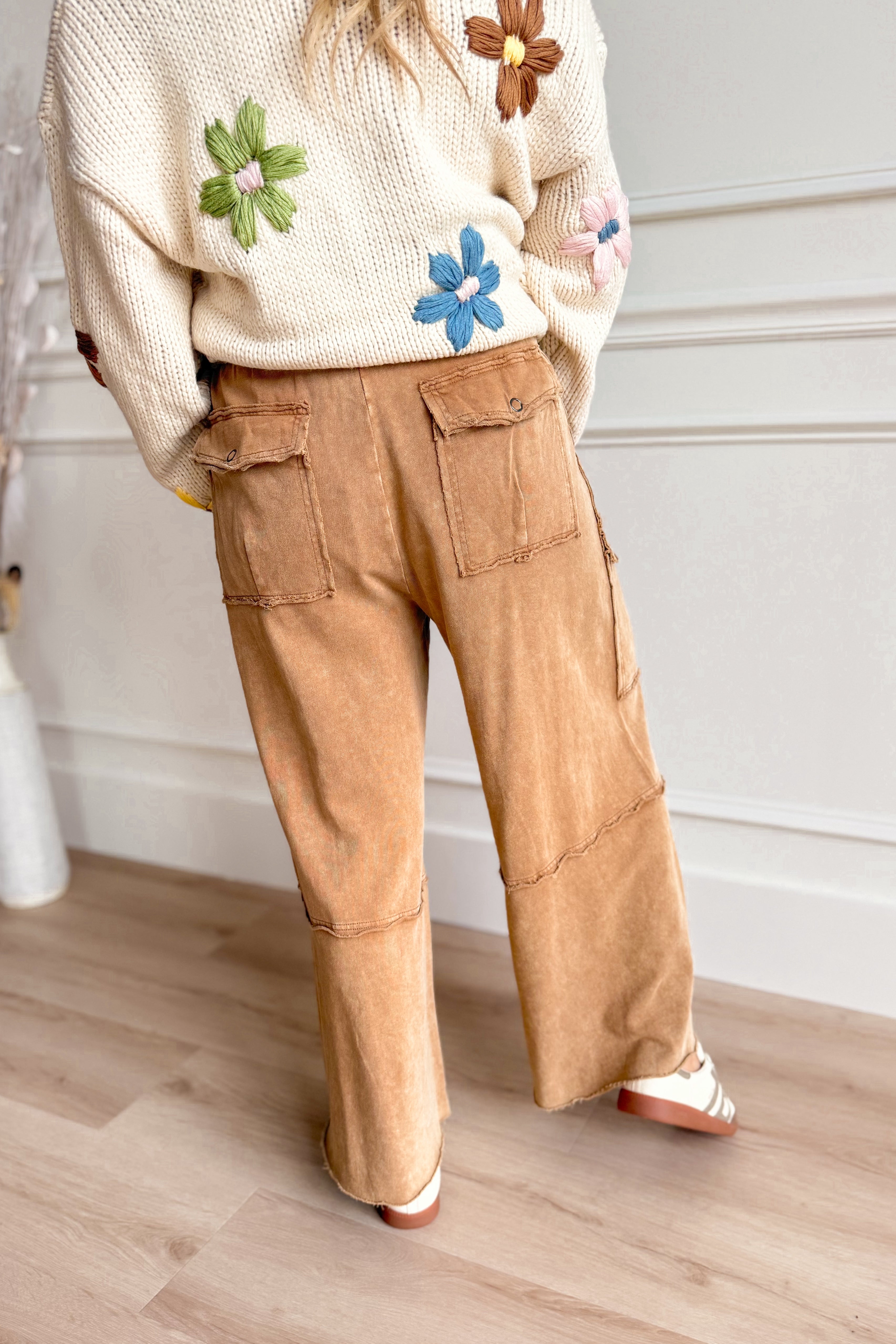 EASEL Mateo Mineral Washed Wide Leg Cargo Pants in neutral tone, relaxed fit, and side pockets, displayed flat on a white background.