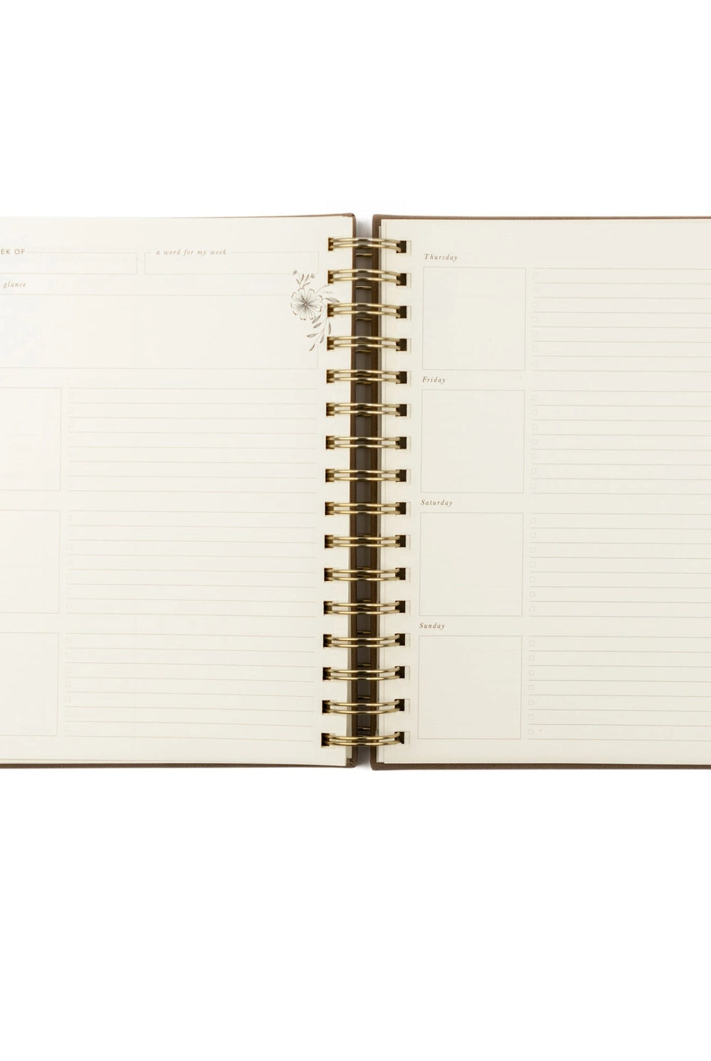 Undated 12-month planner by HOSANNA REVIVAL featuring a sleek cover and organized interior pages for scheduling and note-taking.