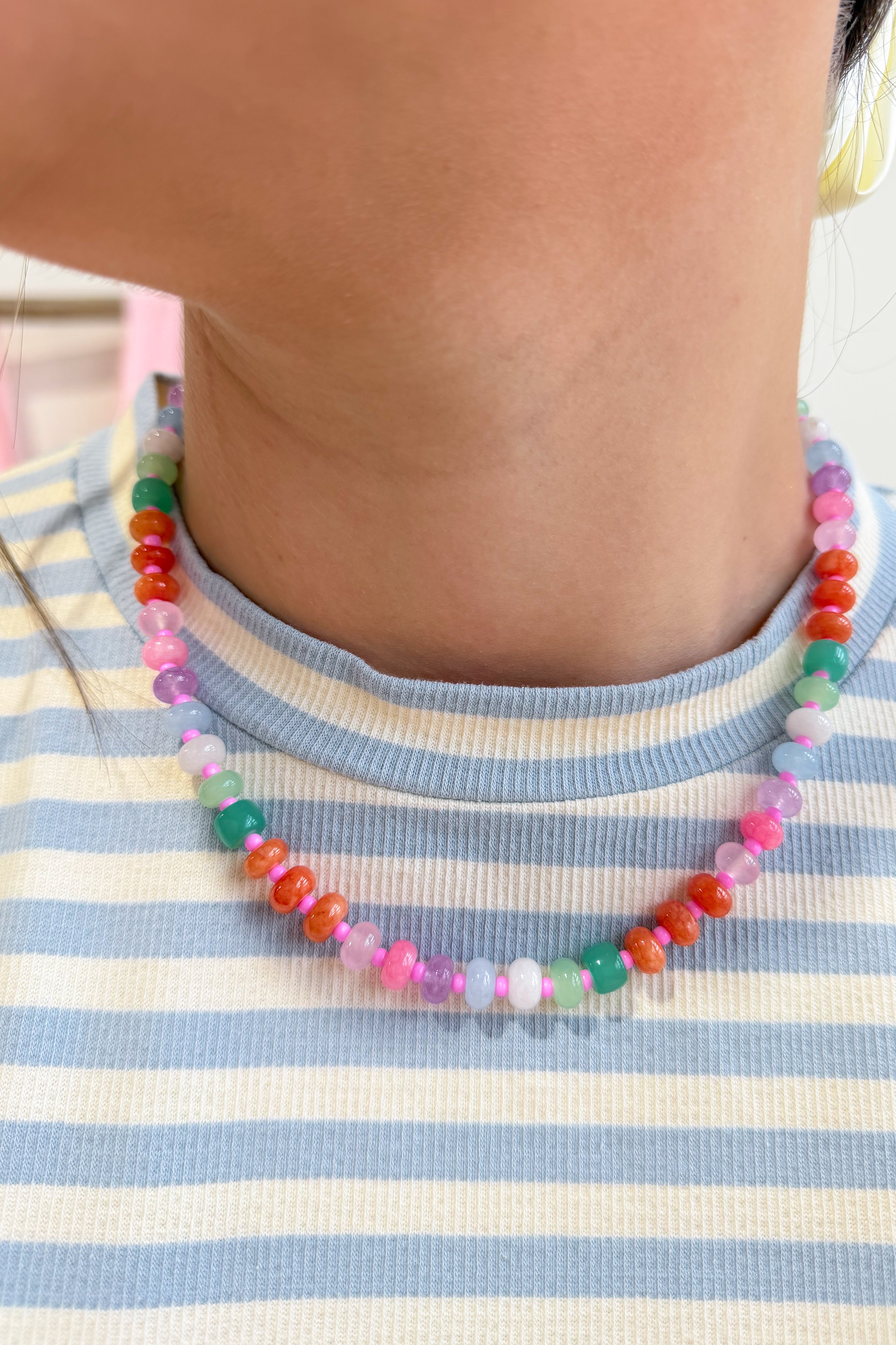 Treasure Jewels pastel gemstone necklace featuring colorful stones on a delicate chain, elegant jewelry piece.