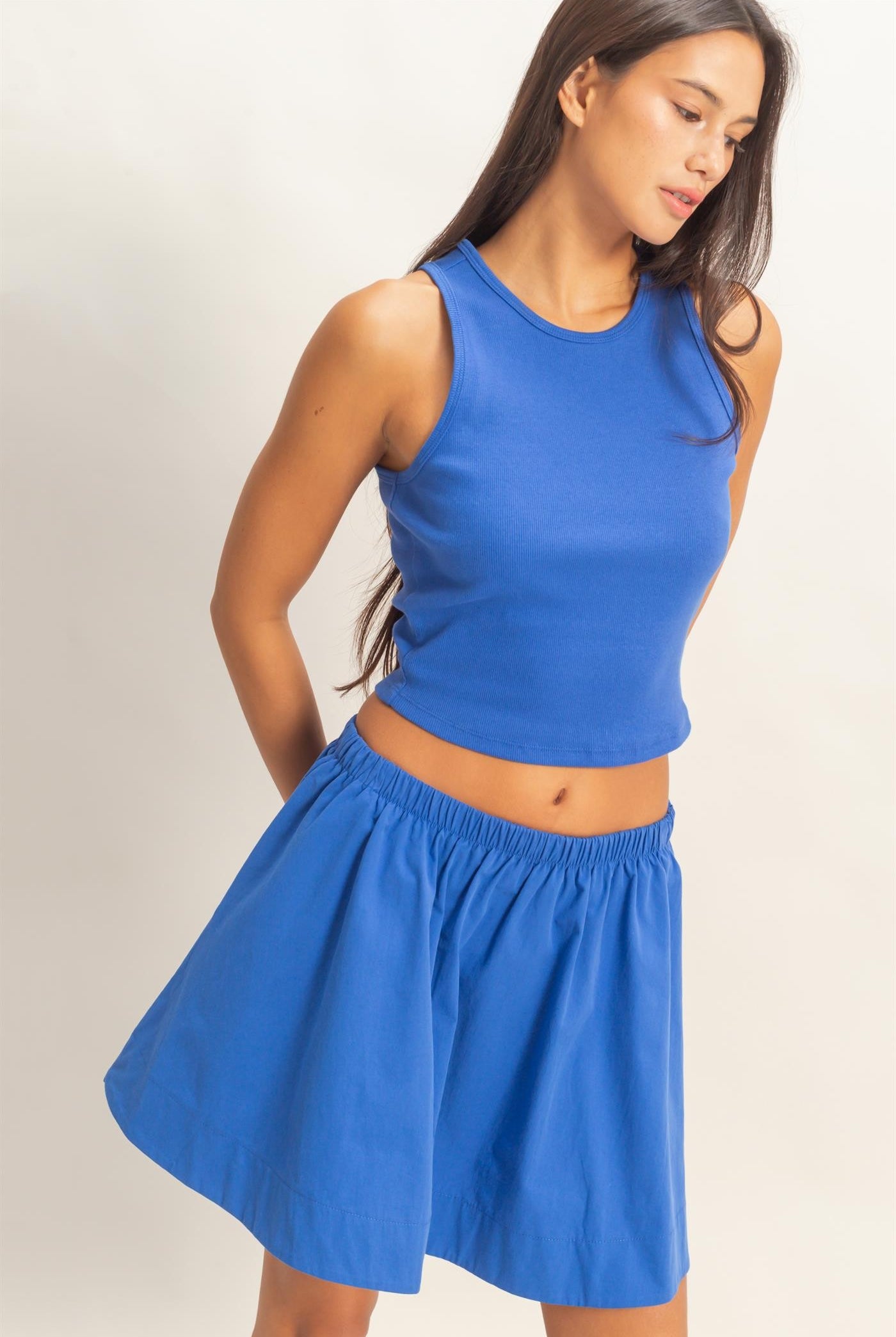 HYFVE Carter cobalt sleeveless ribbed skirt set featuring a fitted crop top and matching high-waisted skirt.