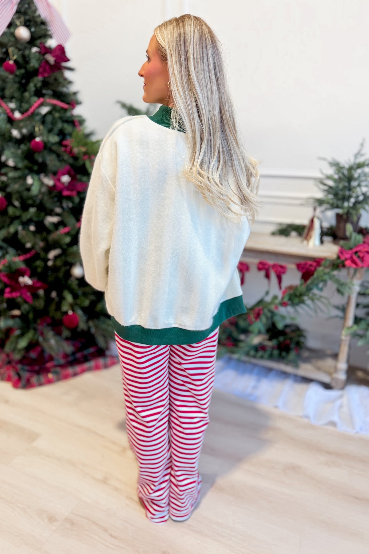 Rudy Red Striped Holiday Pants from BUCKET LIST, 156 pants style, featuring festive red and white holiday stripe pattern.
