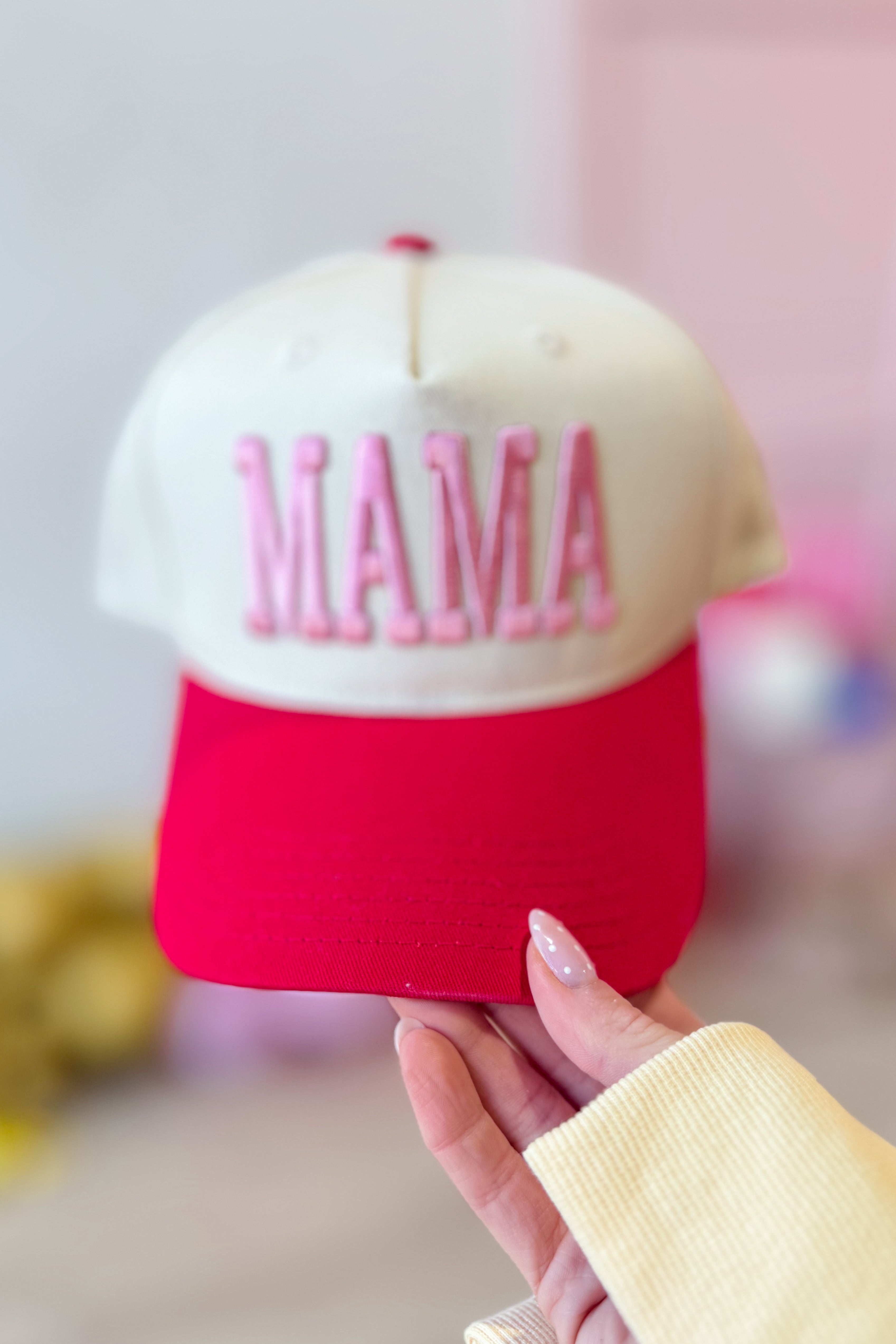 ETTA & EAST Mama Puff Trucker Hat featuring a comfortable, stylish design with a puffed front panel and adjustable strap.