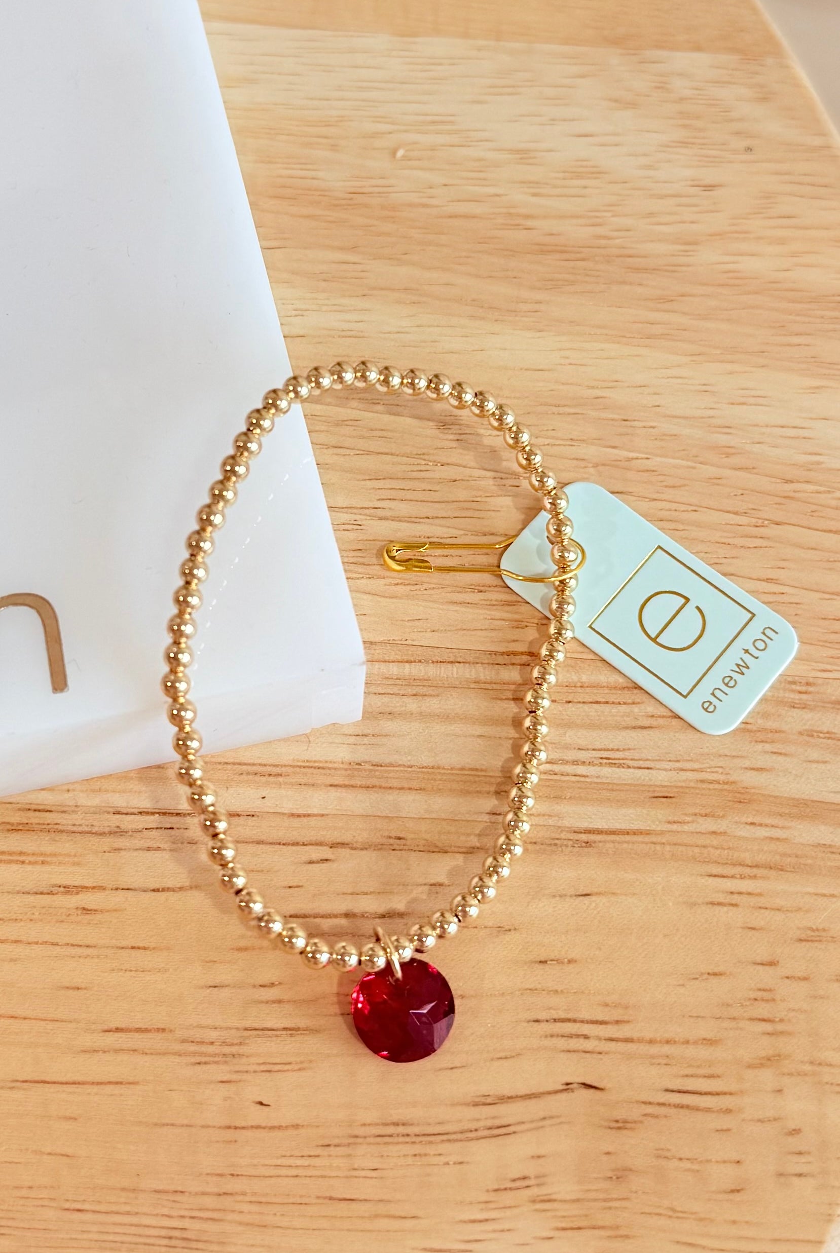 Enewton 3mm classic birthstone bracelet with colorful gemstones, delicate jewelry piece featuring a silver chain and round stones.