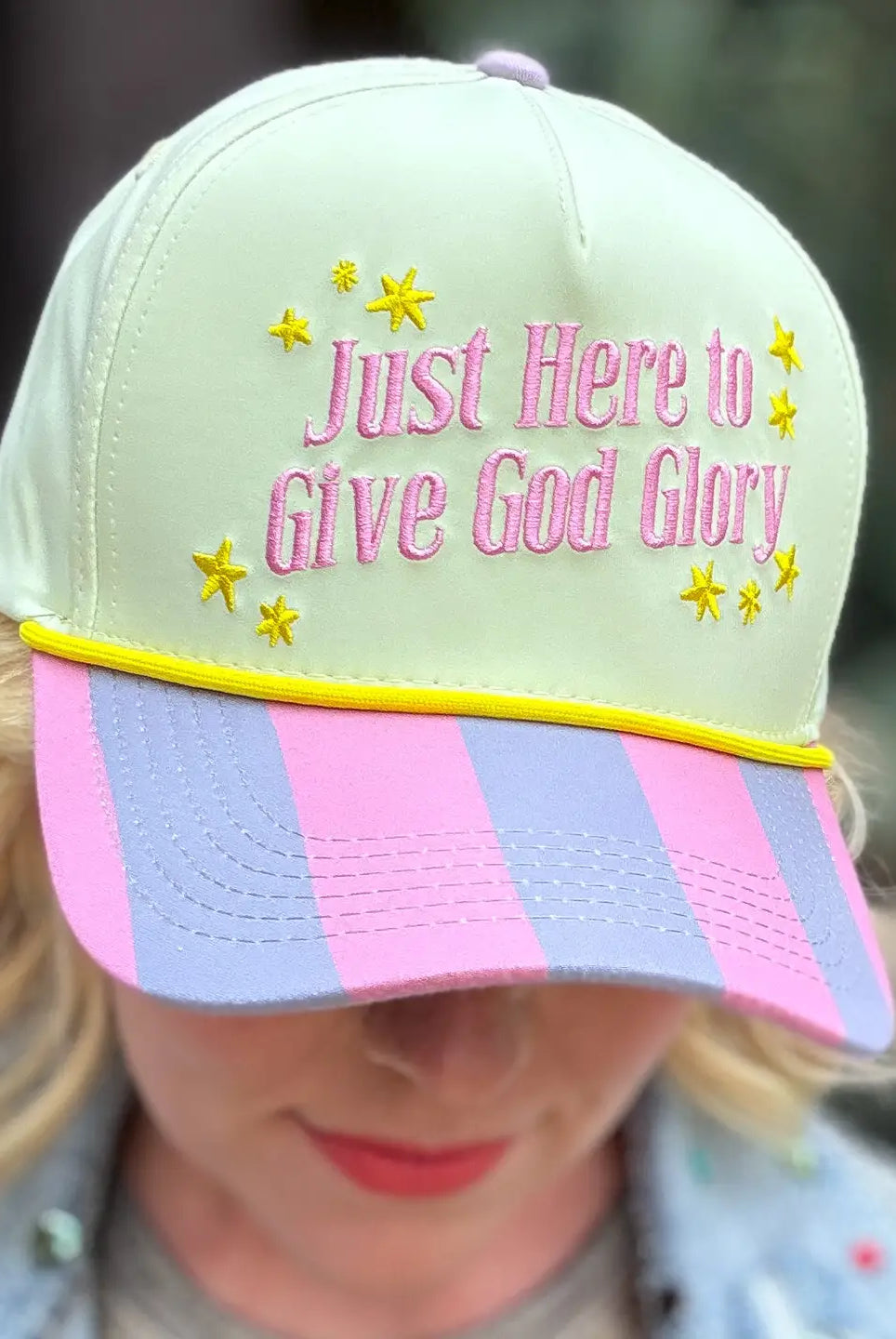 Give God Glory baseball hat by TAYLOR ELLIOT DESIGNS featuring embroidered text, positioned on a head mannequin.