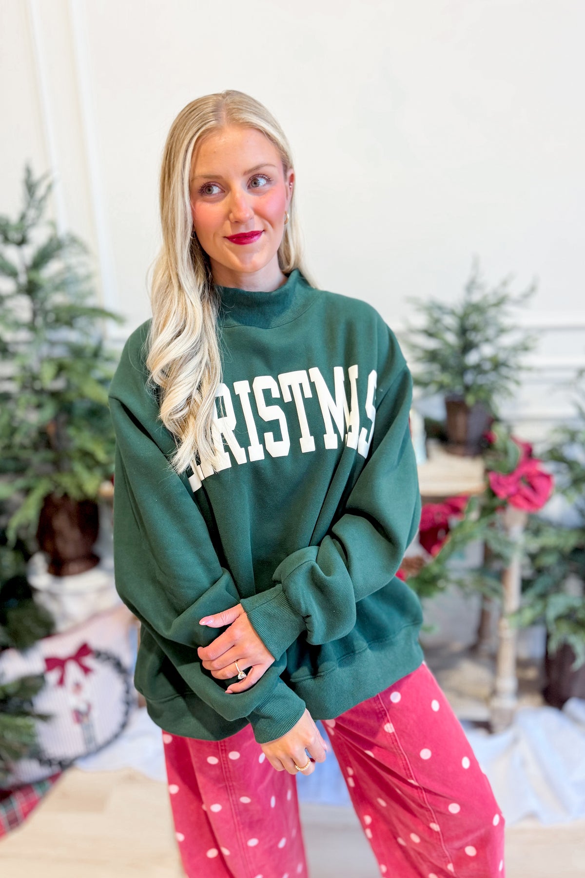 Black Christmas mock neck sweatshirt from BUCKET LIST 137 Graphic Sweatshirts collection, featuring festive holiday design.