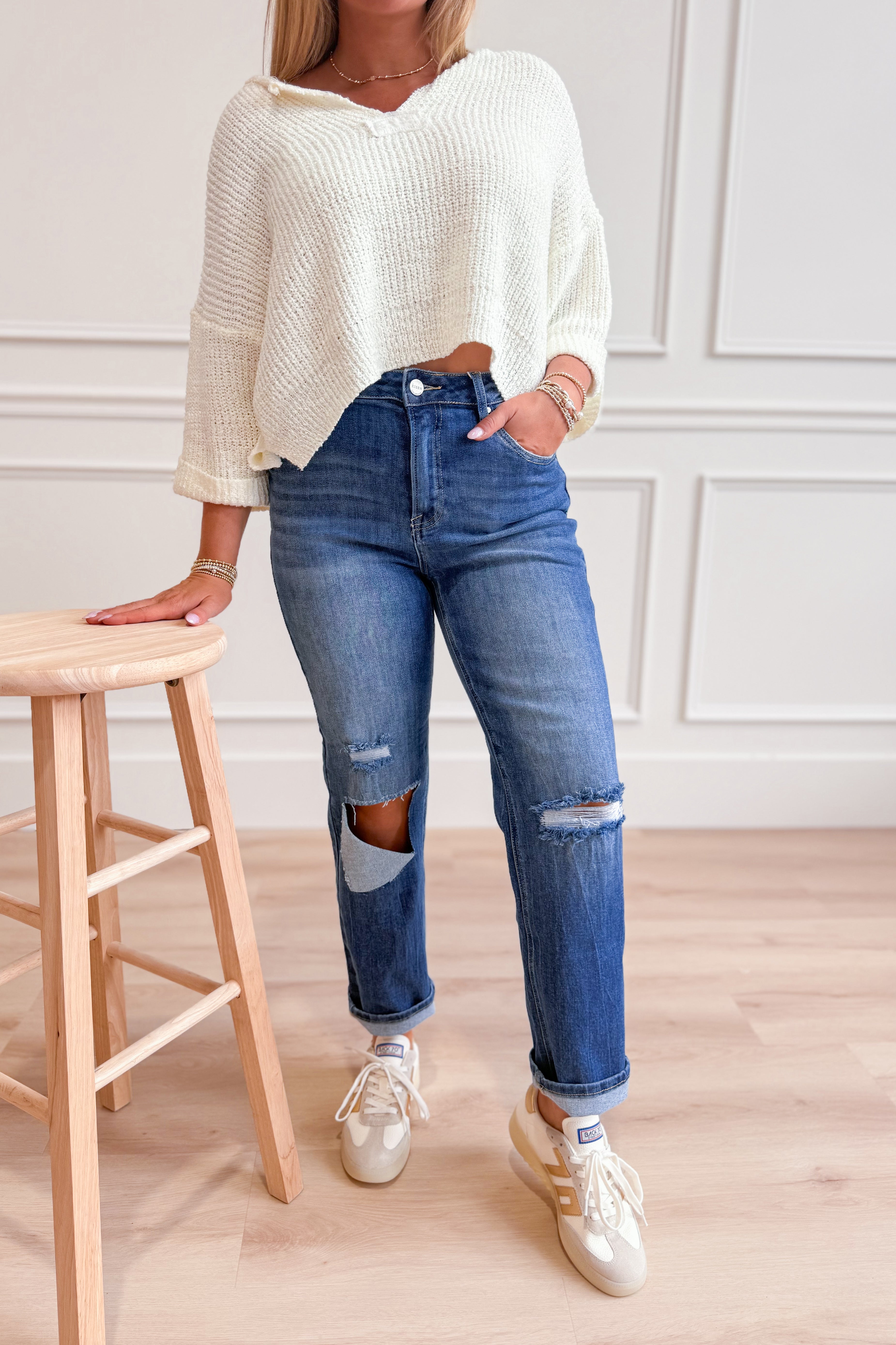 Risen Kendra high-rise distressed relaxed fit jeans, 146 Core style, showing the faded denim with ripped details and relaxed silhouette.