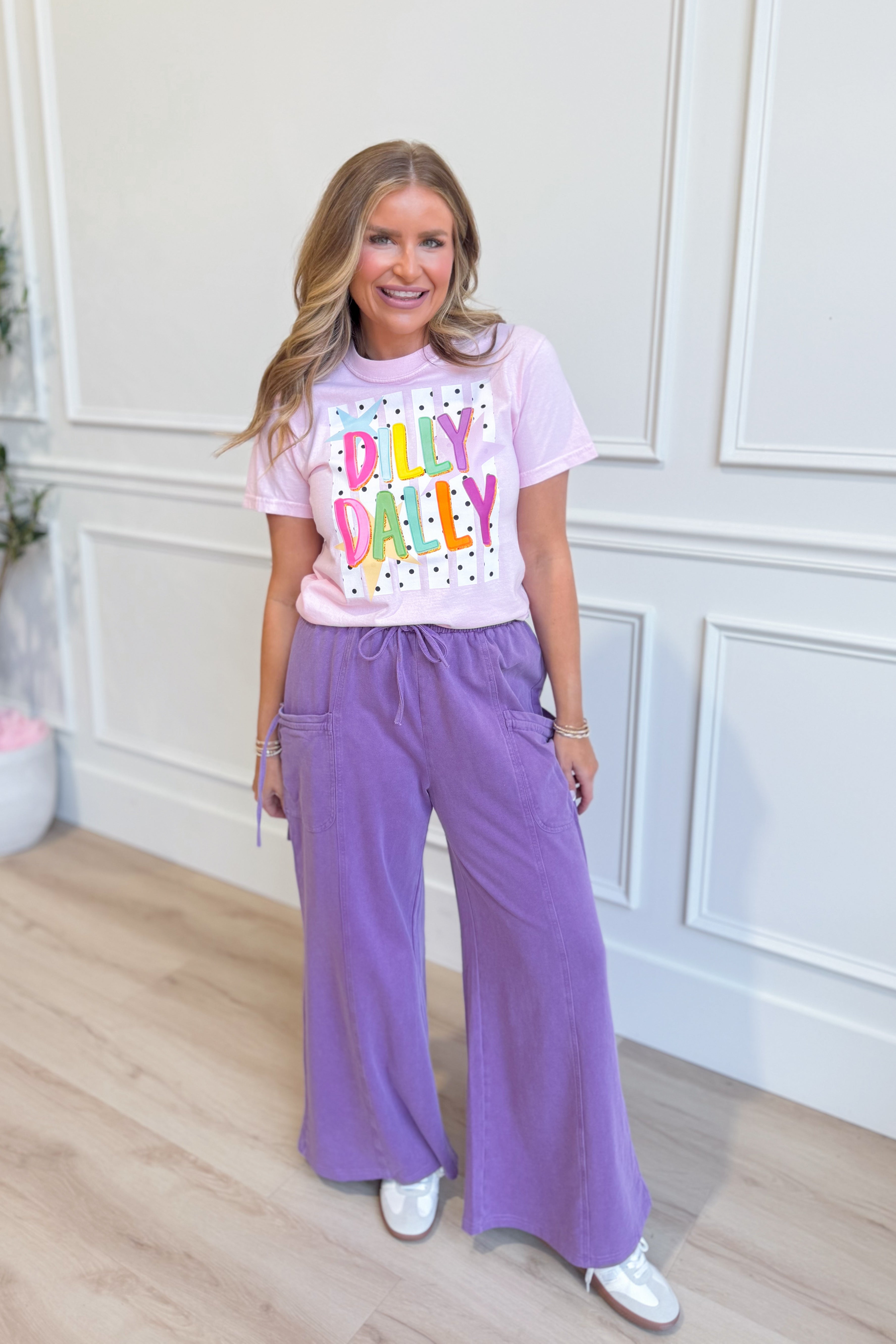 Colorful Dilly Dally graphic T-shirt from TWN BOUTIQUE featuring multi-color abstract design and casual fit.