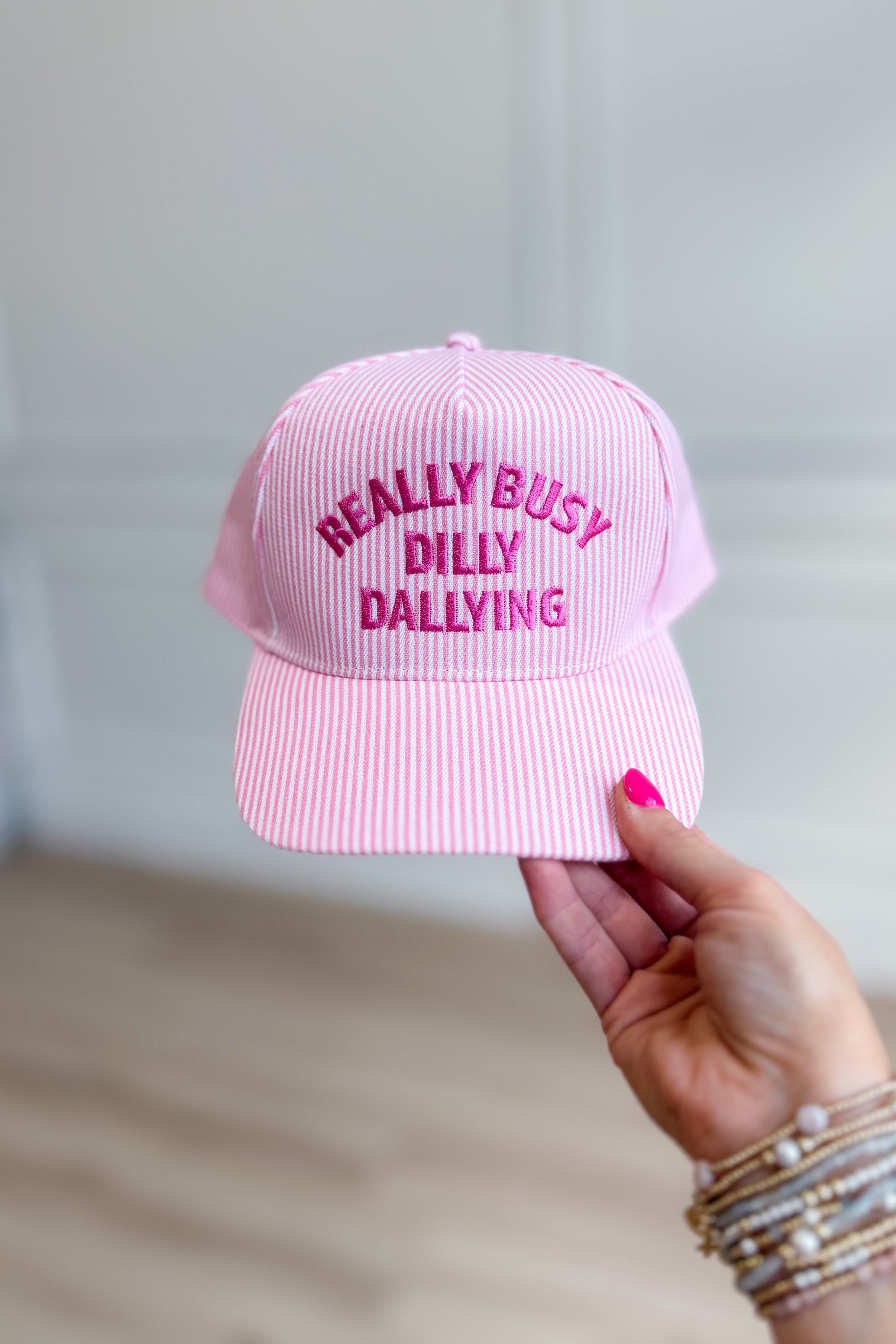 FASHION CITY Busy Dilly Dallying Hat, a stylish 217 hair accessory with colorful fabric and playful design.