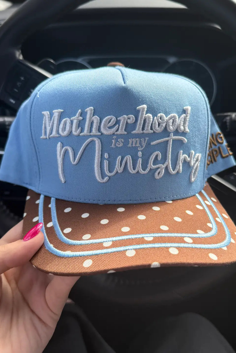 Broke Babe Motherhood Is My Ministry trucker hat with adjustable strap and embroidered design, casual accessory for moms.