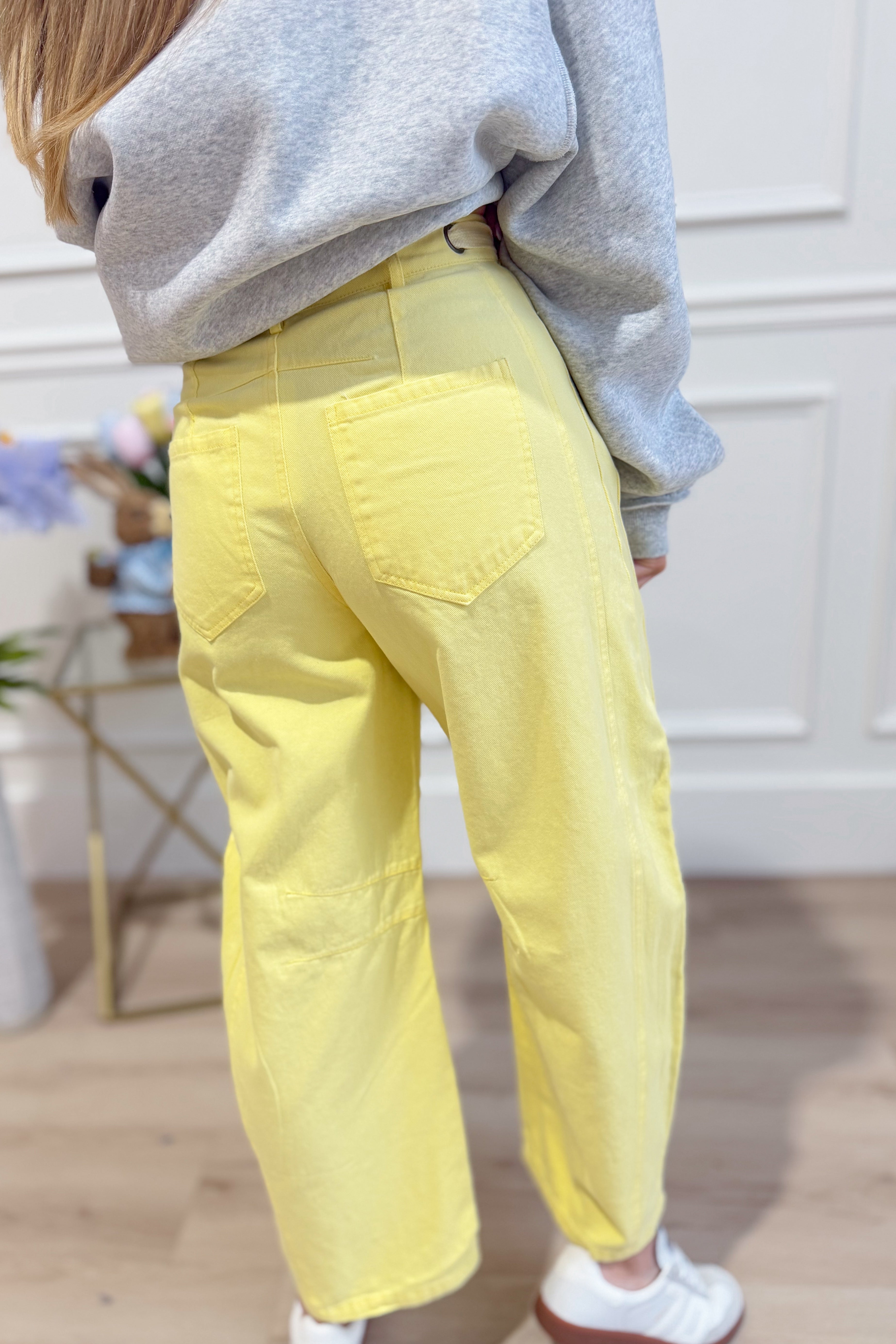 Light yellow mineral-washed PEACH LOVE Candice barrel jeans with eyelet details, part of the 147 Novelty Jeans collection.