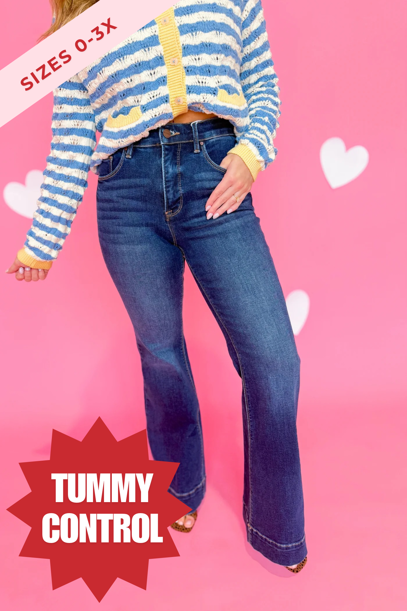 Risen Linus high-rise tummy control flare jeans in dark wash, featuring a fitted waist and wide leg openings.