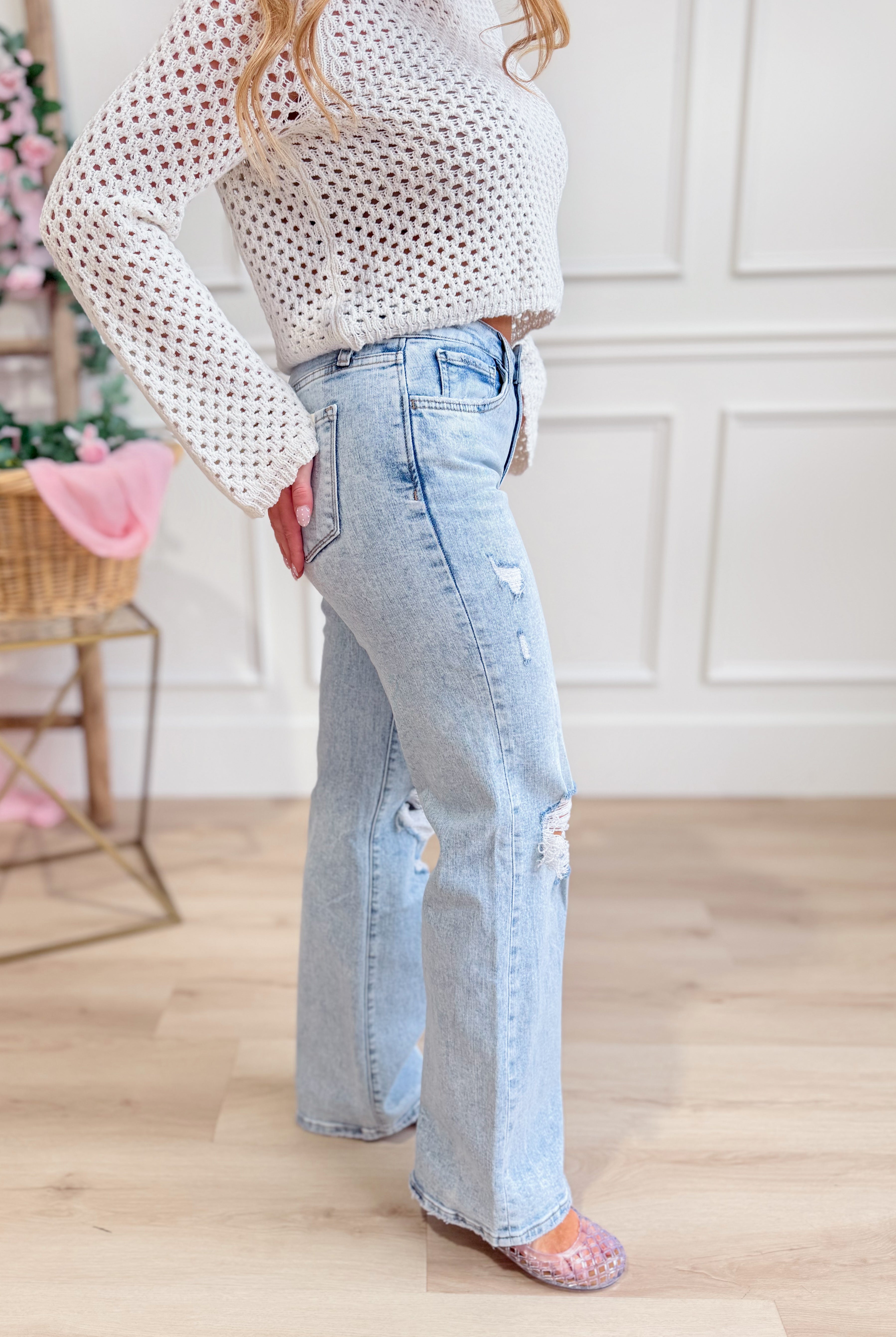 Vervet Slick high-rise vintage wide-leg 146 core jeans with classic denim wash and relaxed fit, showcased on a model.