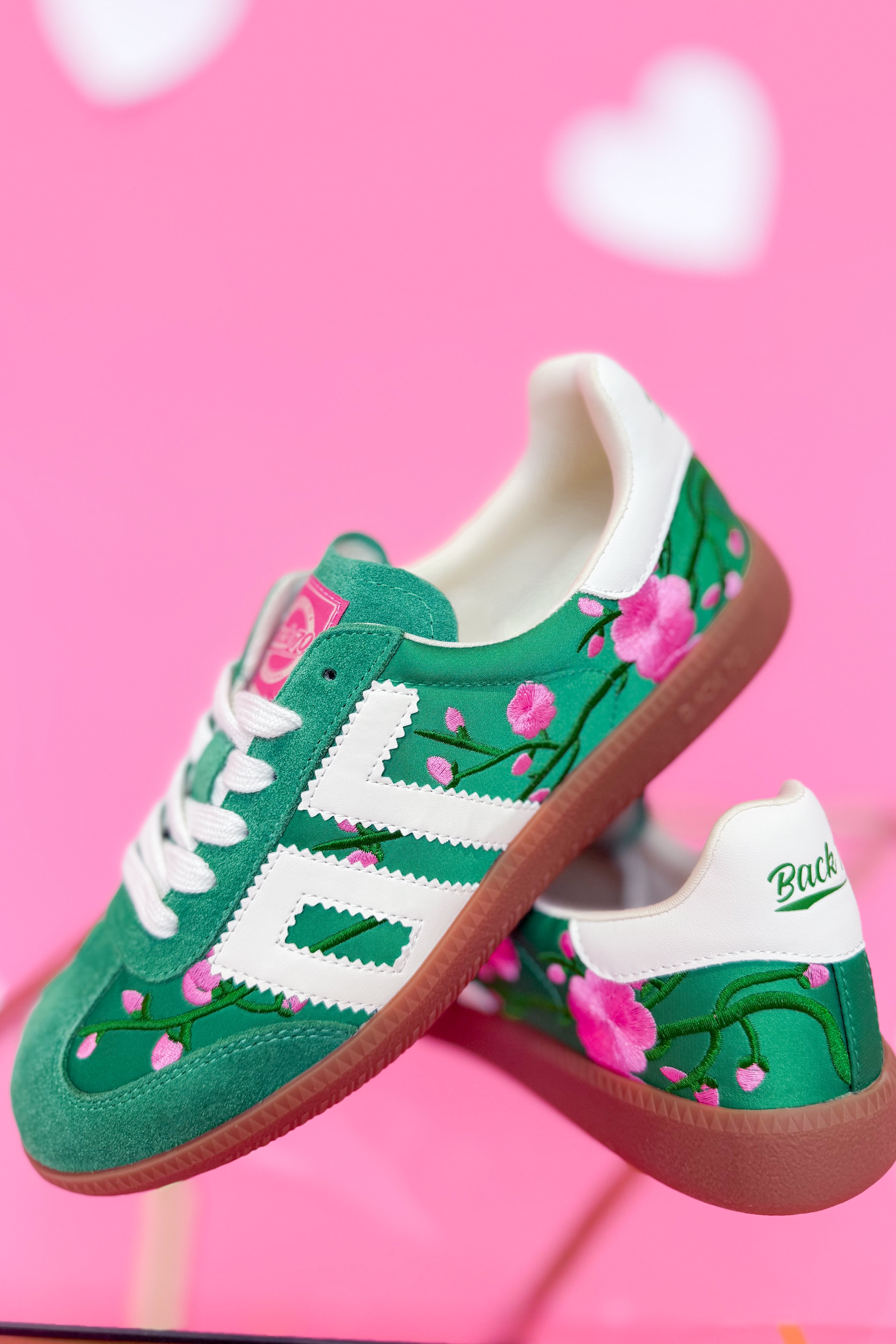 BACK70 Ghost sneakers with green floral design, 205 sneaker style, showcasing the stylish and vibrant athletic footwear.