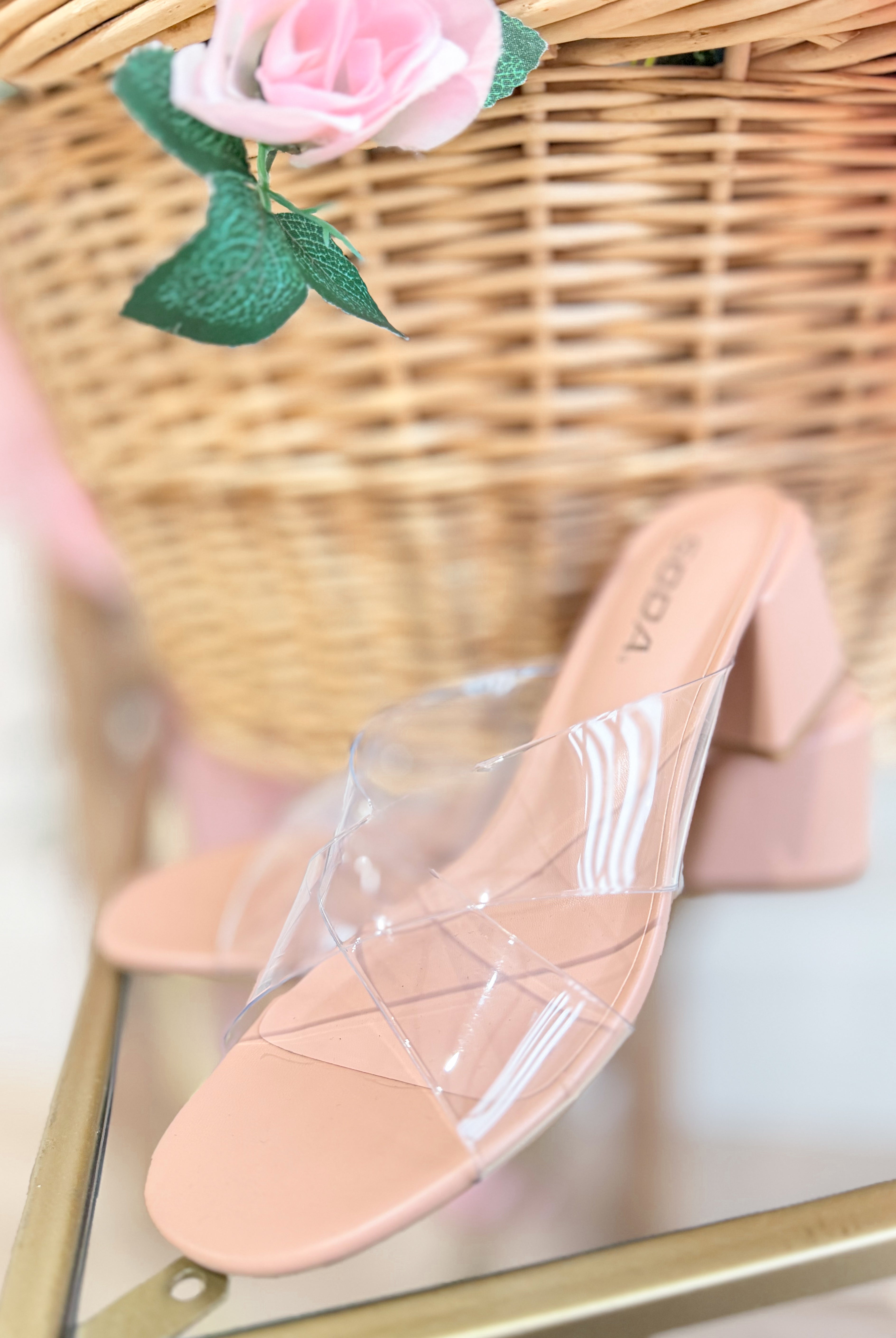 SODA Sarah Clear Criss Cross Heel shoe with transparent straps and a stylish heel, showcasing a chic and modern design.