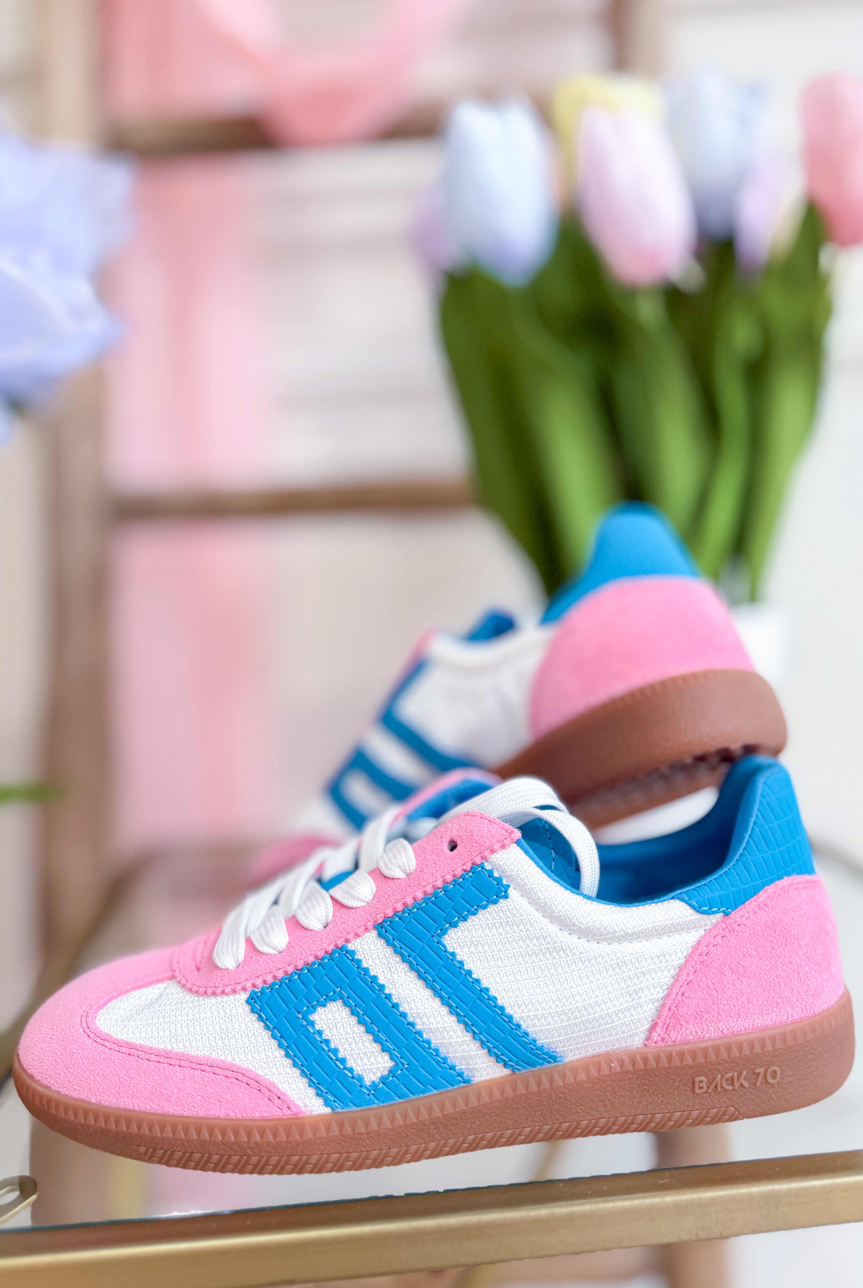 BACK 70 Ghost Sneakers in pink and turquoise, 205 style, featuring vibrant color accents and a sporty design.