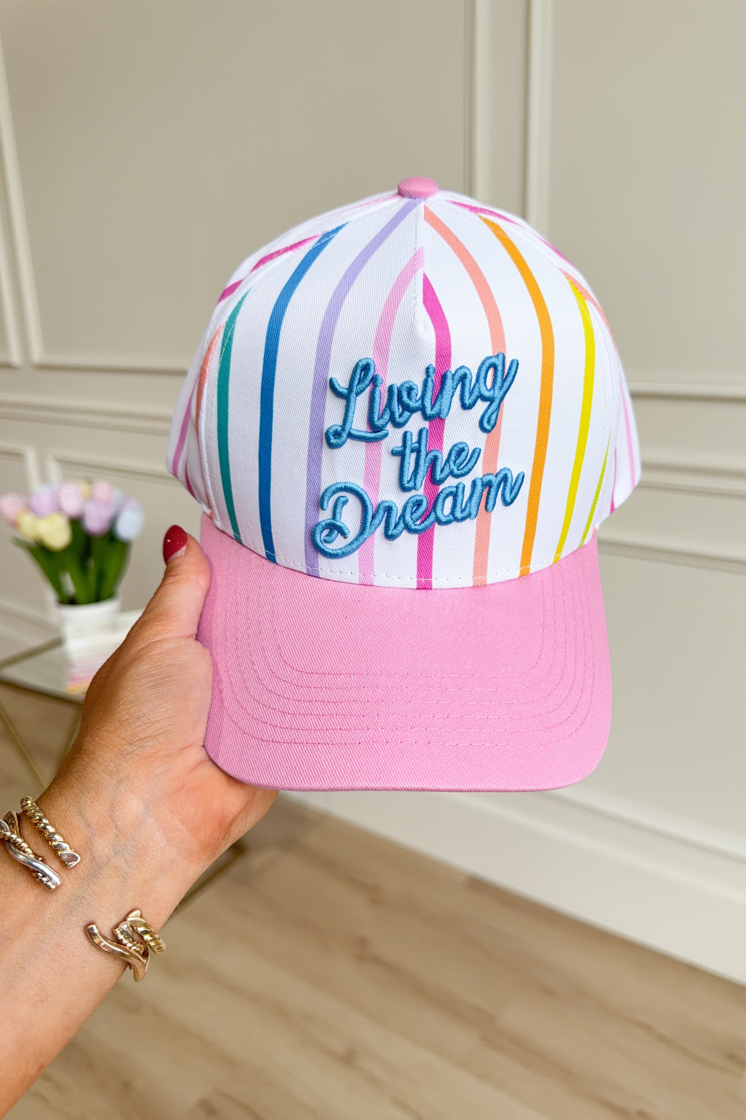 Taylor Elliot Designs Living The Dream baseball hat with 217 hair accessories, featuring a stylish embroidered design.