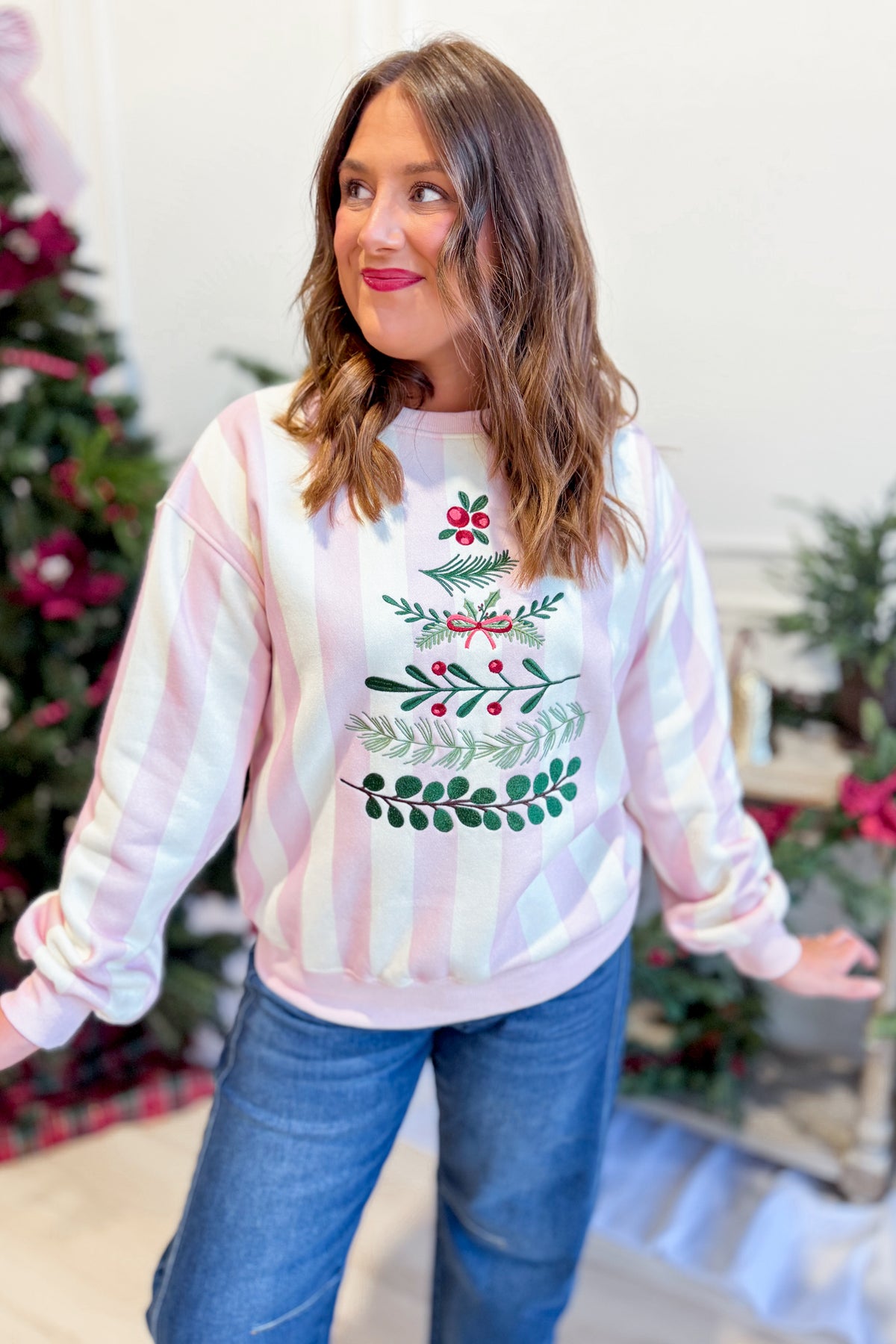 PEACH LOVE Serena wreath and striped graphic sweatshirt featuring floral and striped patterns on soft, casual pullover.